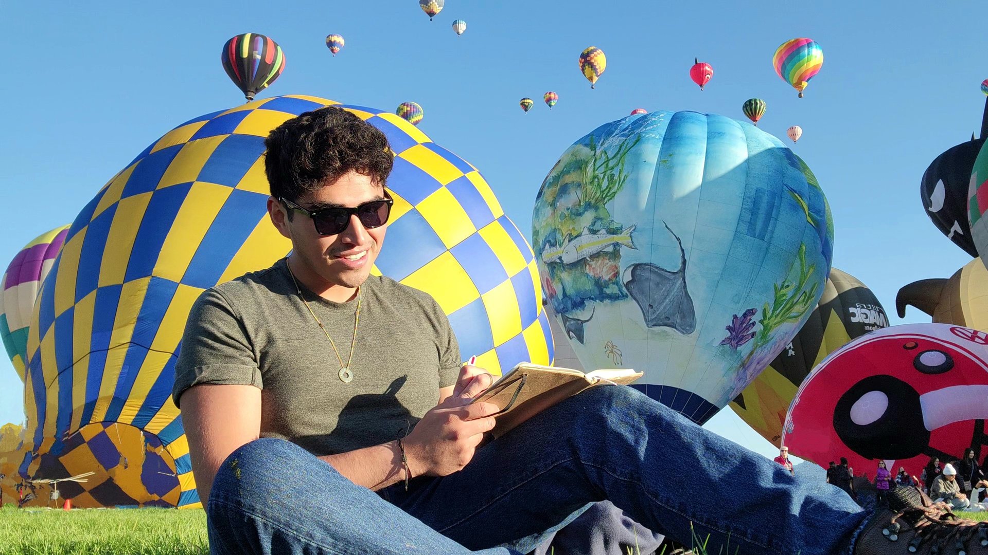 black and brown leather padded tub sofa