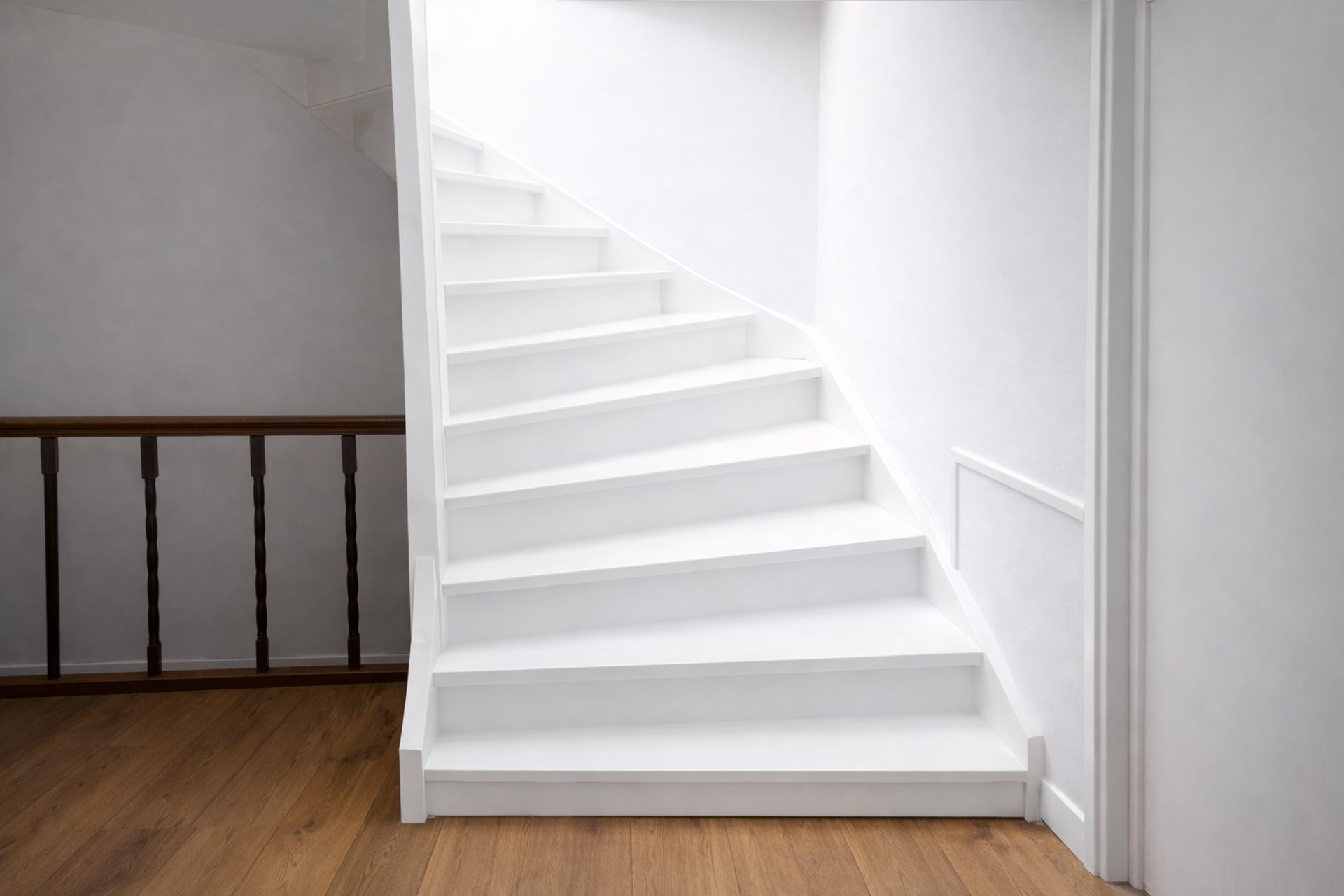 an abstract photo of a curved building with a blue sky in the background