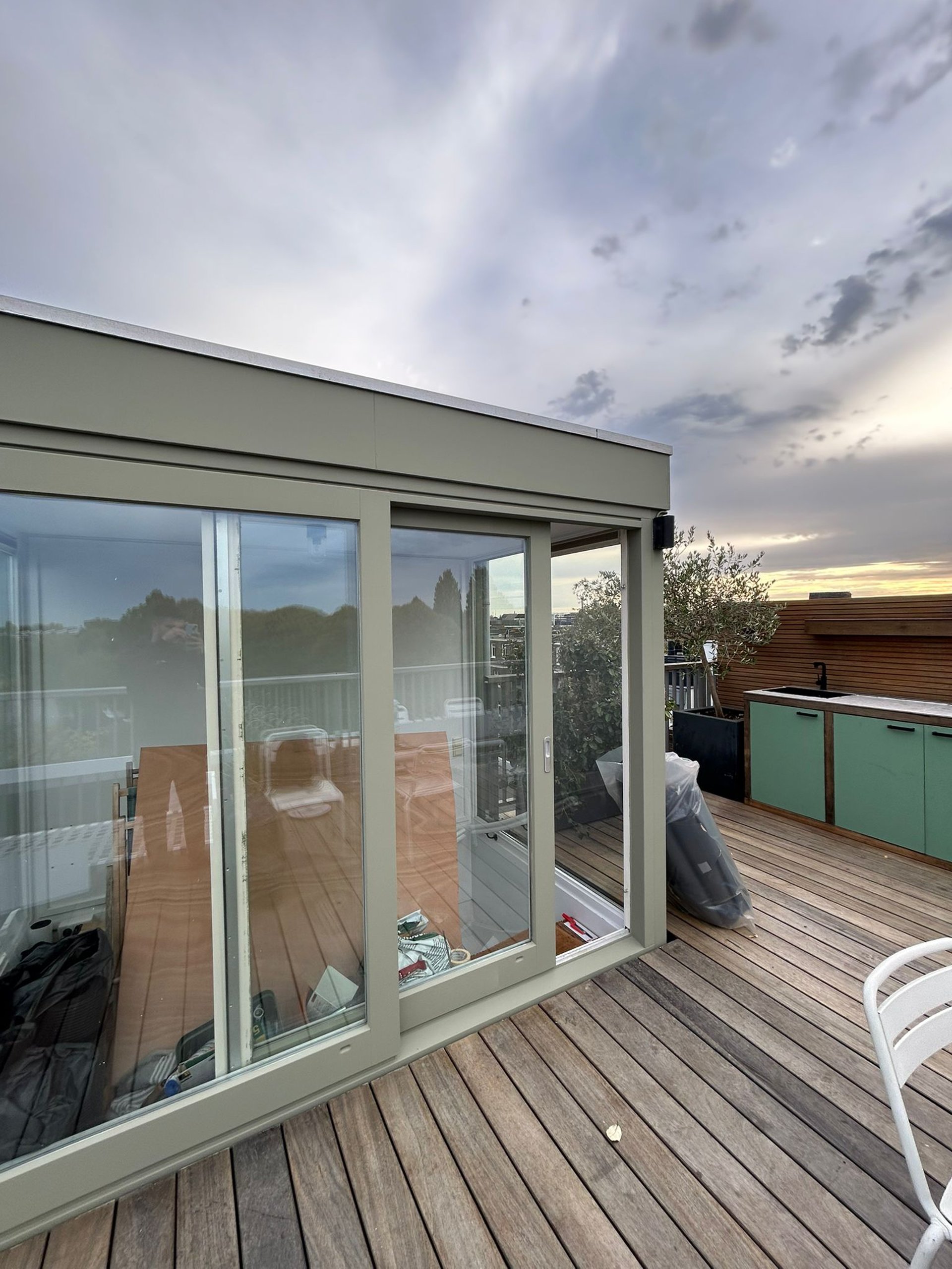 an abstract photo of a curved building with a blue sky in the background