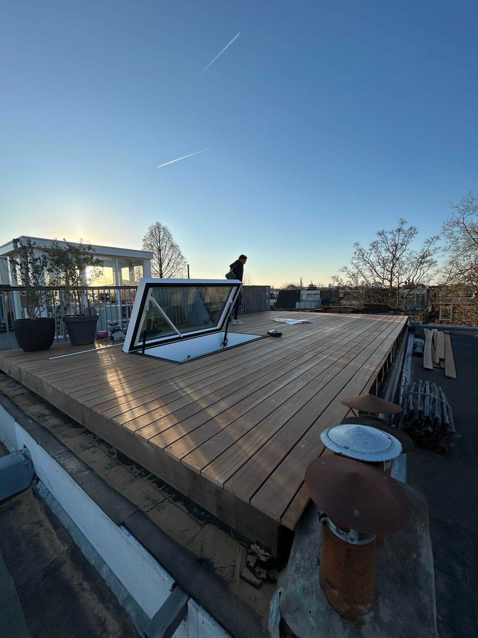an abstract photo of a curved building with a blue sky in the background