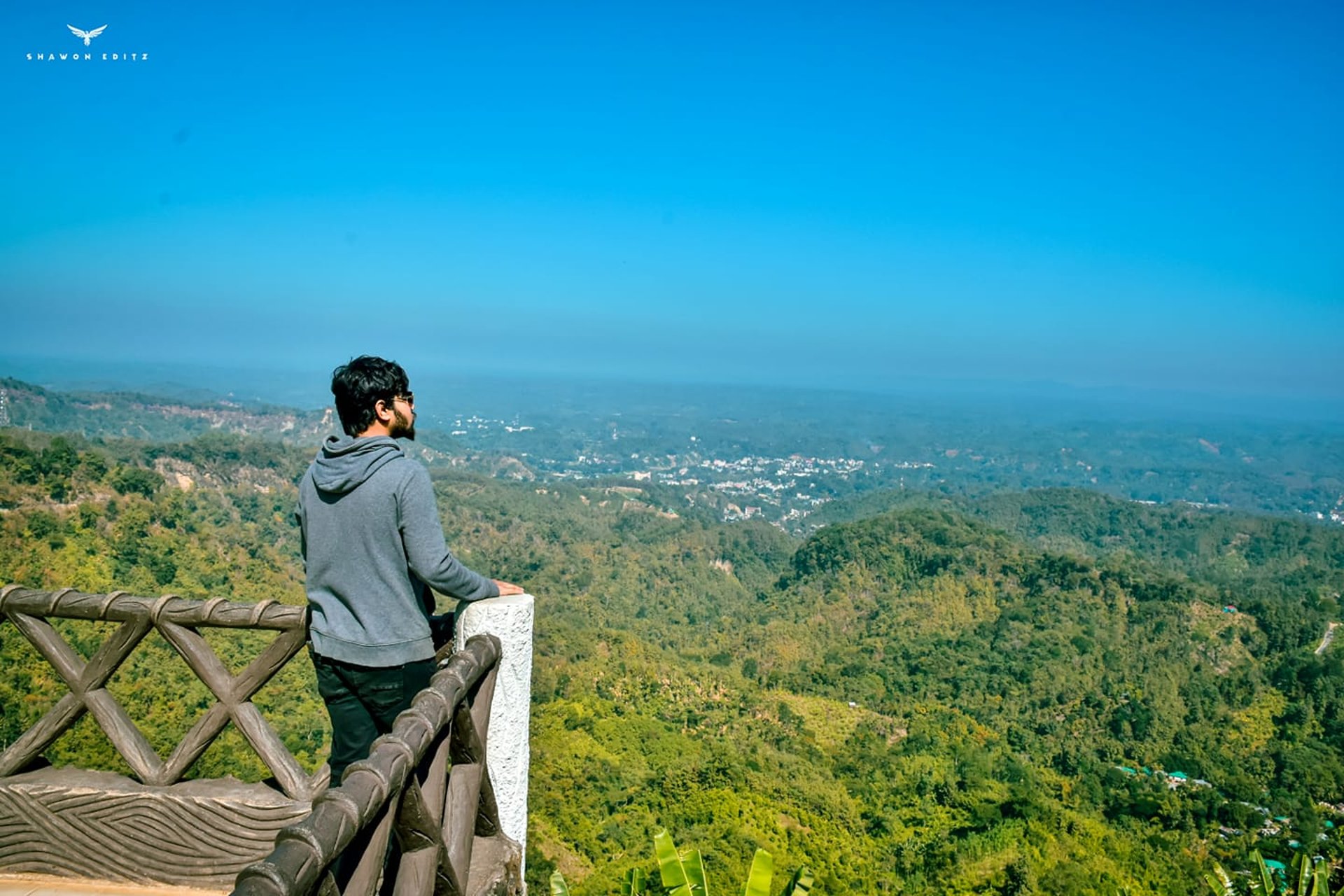 black and brown leather padded tub sofa
