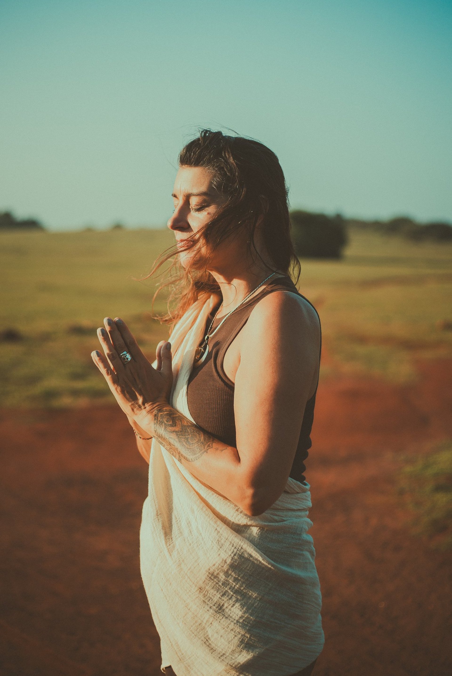 an abstract photo of a curved building with a blue sky in the background