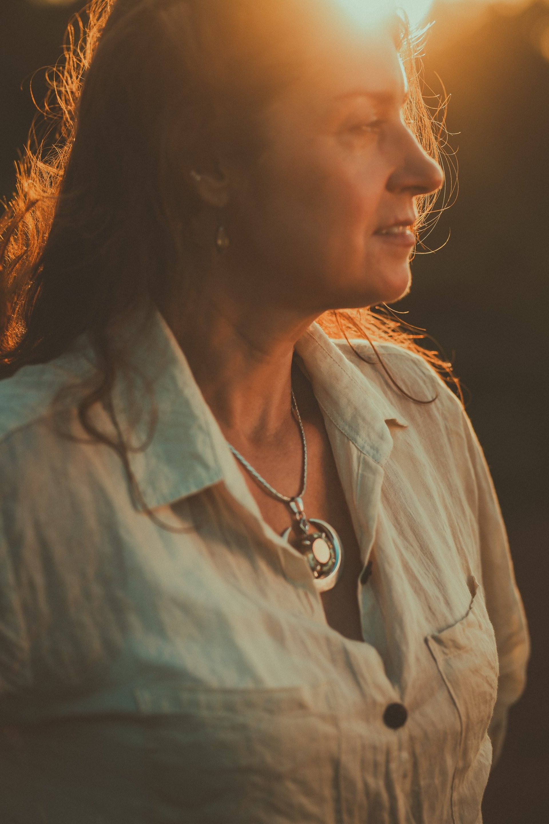 an abstract photo of a curved building with a blue sky in the background