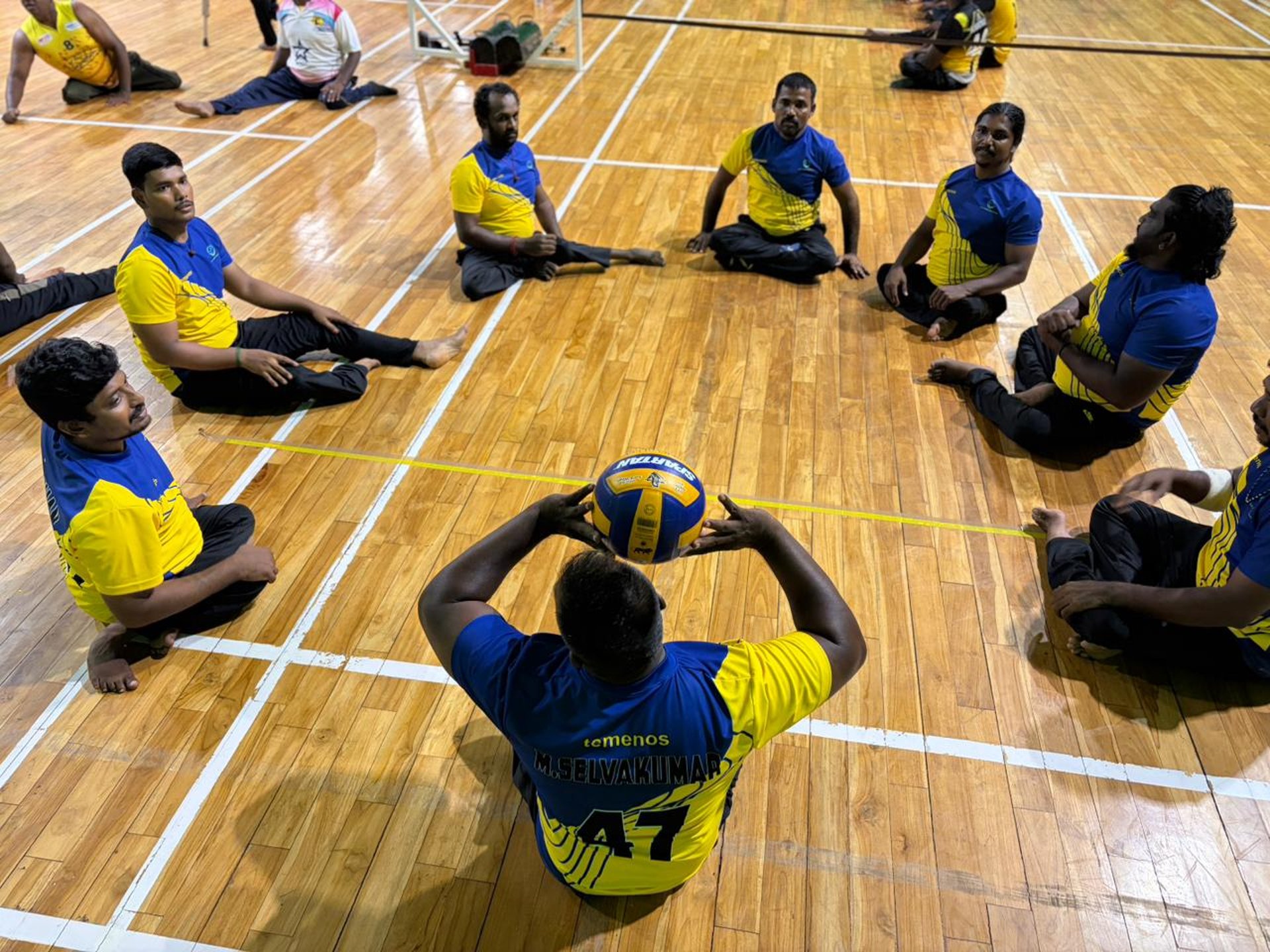 woman wearing yellow long-sleeved dress under white clouds and blue sky during daytime