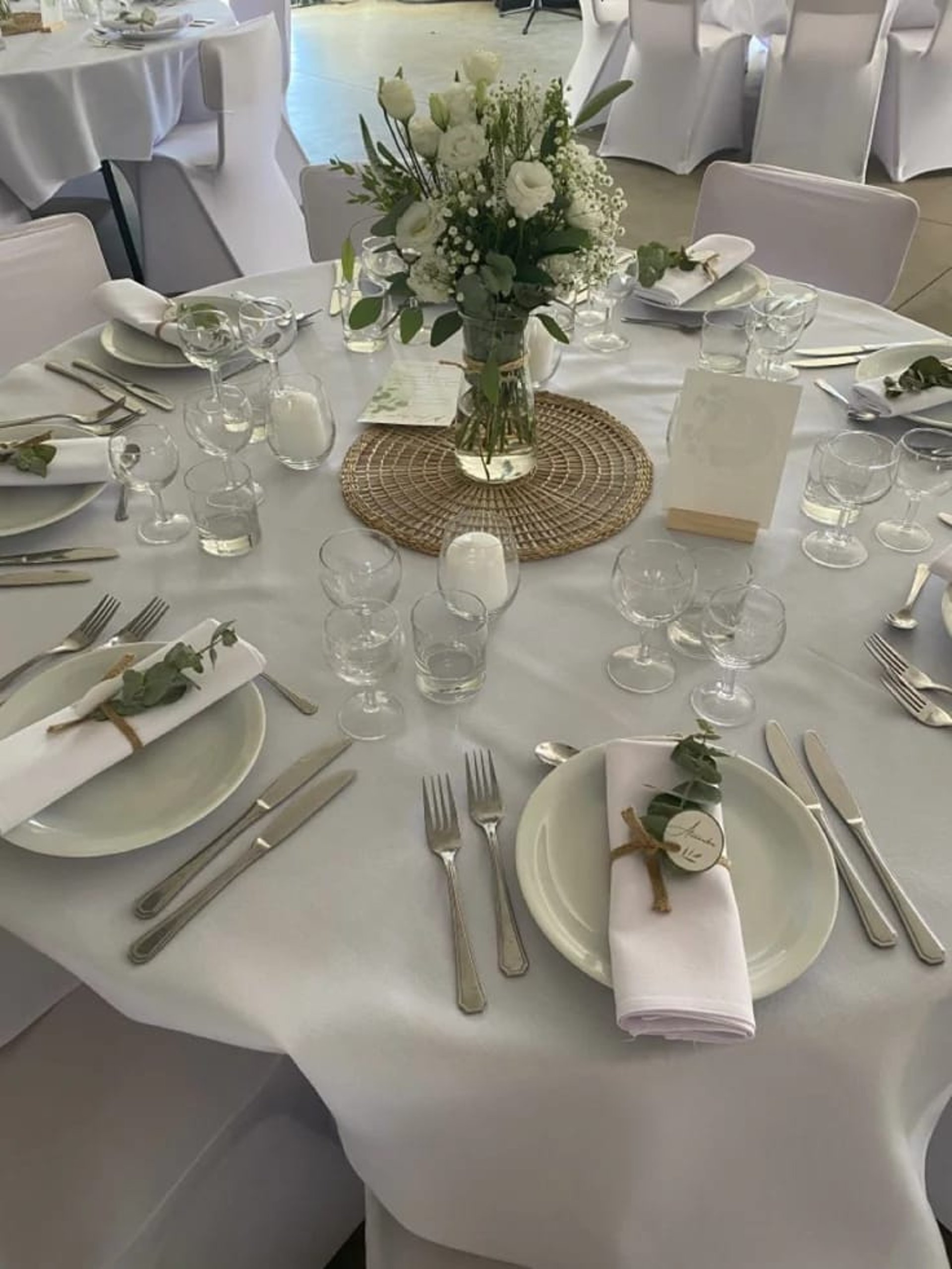 an abstract photo of a curved building with a blue sky in the background