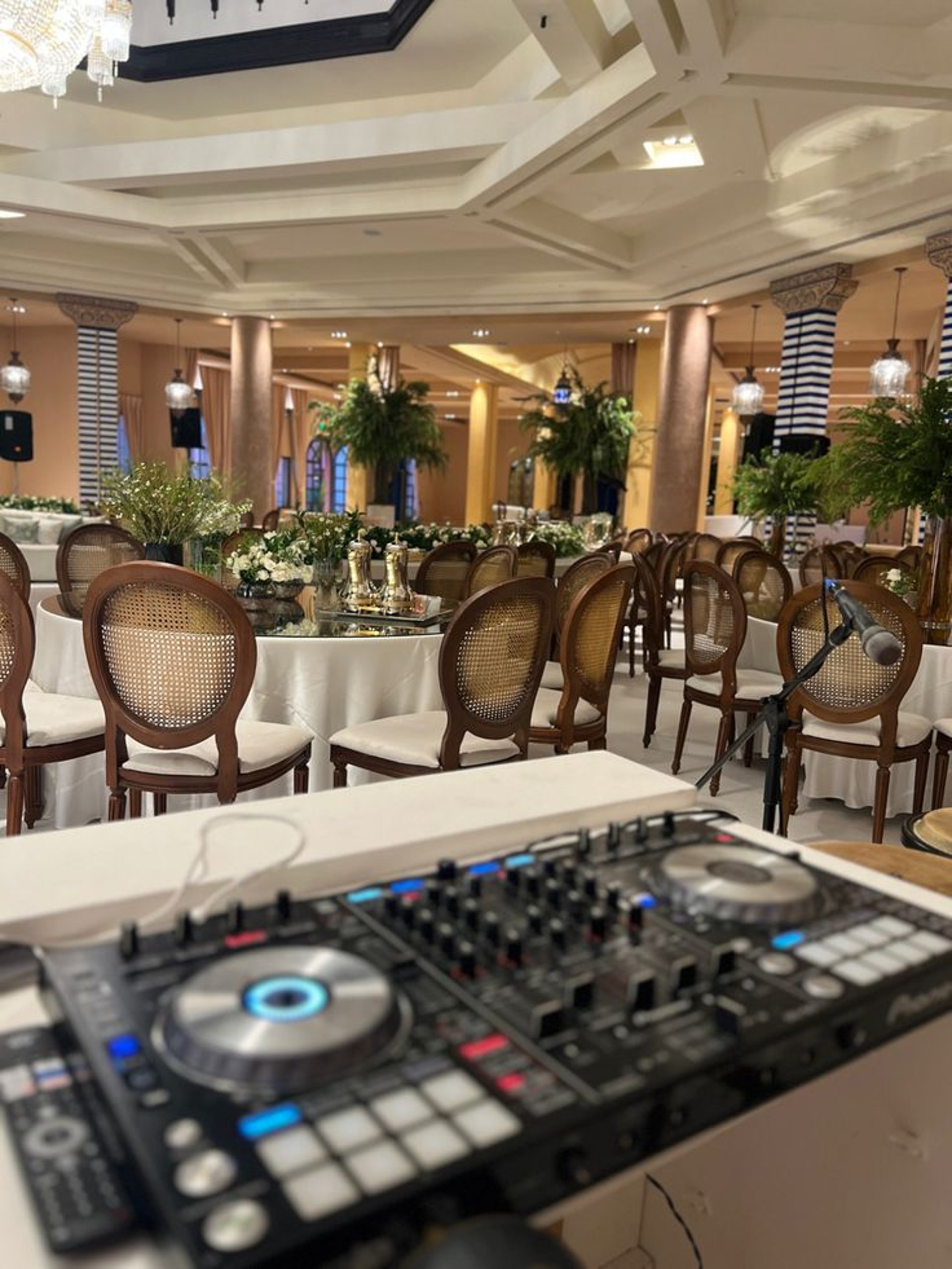 an abstract photo of a curved building with a blue sky in the background