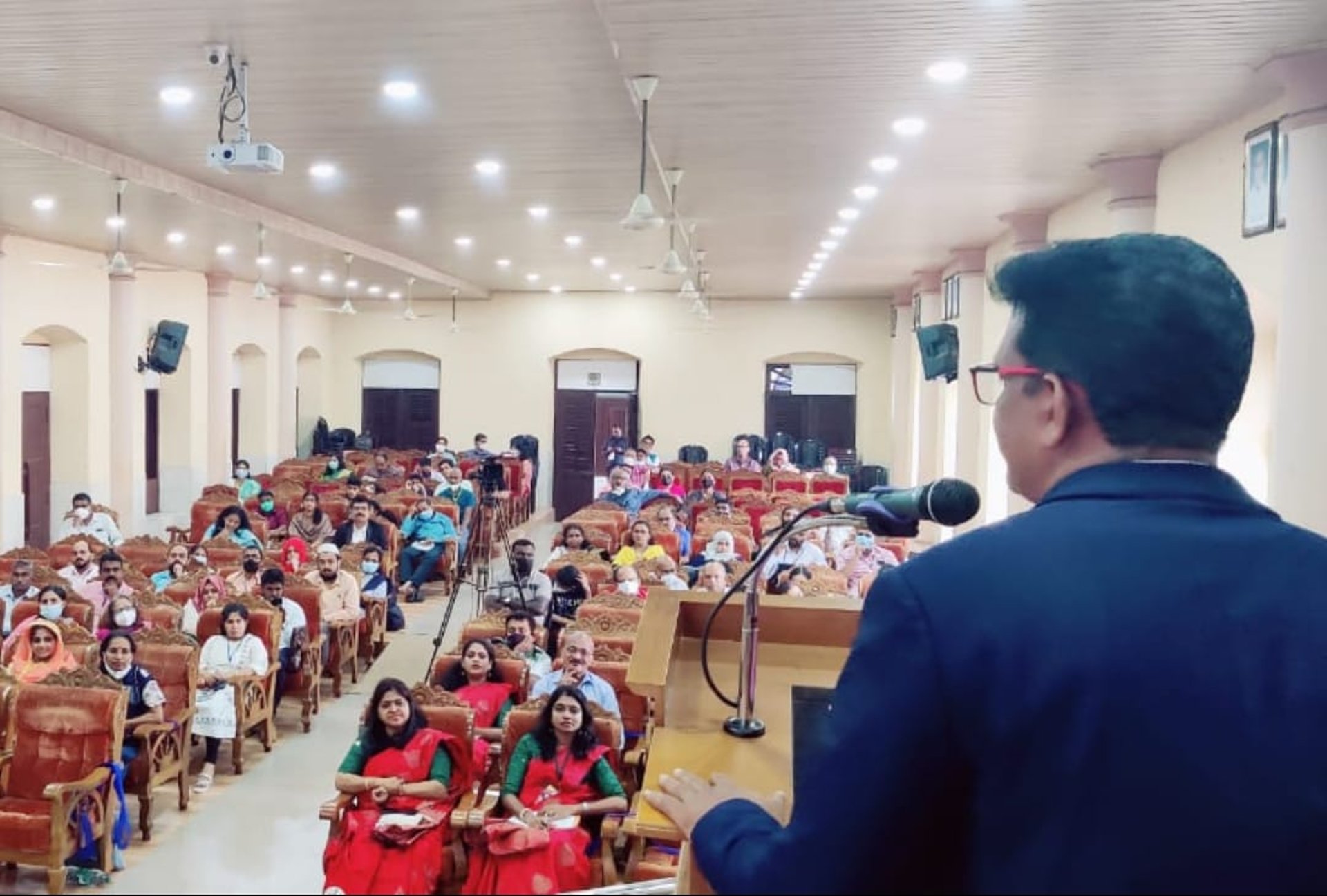 woman wearing yellow long-sleeved dress under white clouds and blue sky during daytime