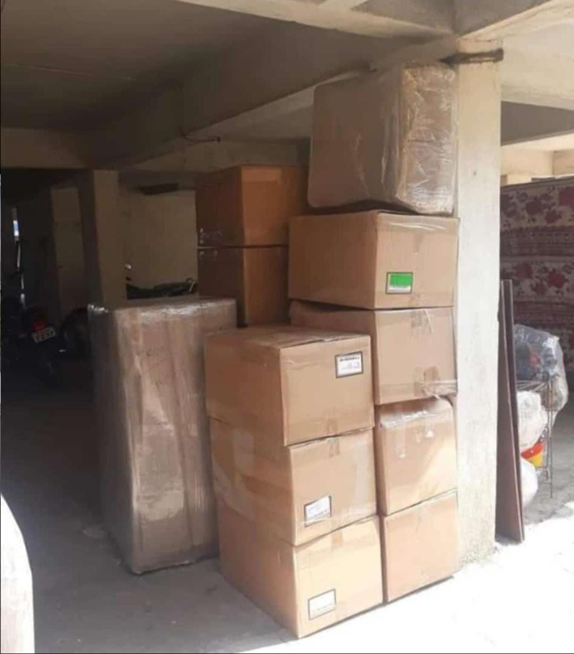 an abstract photo of a curved building with a blue sky in the background