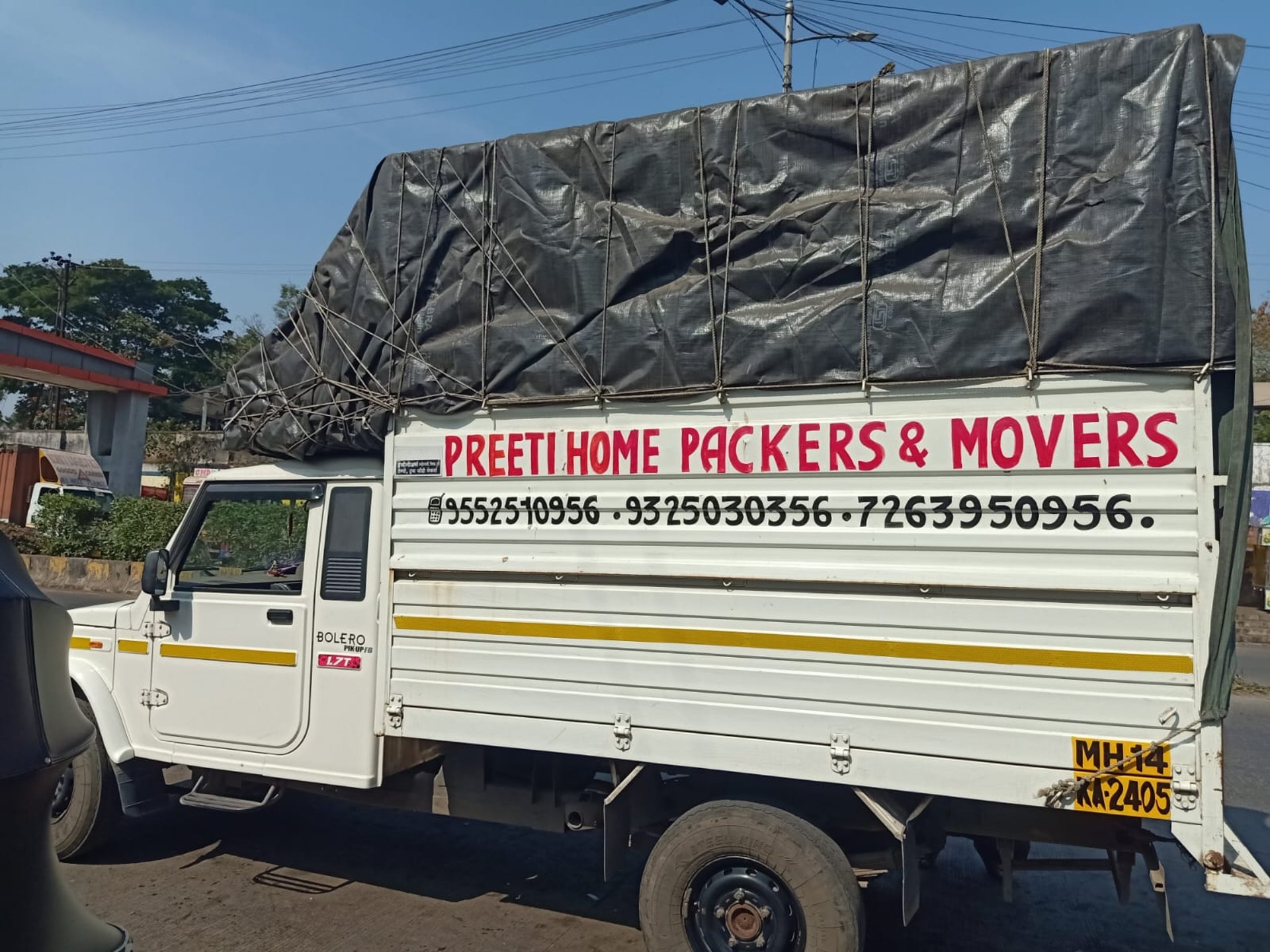an abstract photo of a curved building with a blue sky in the background