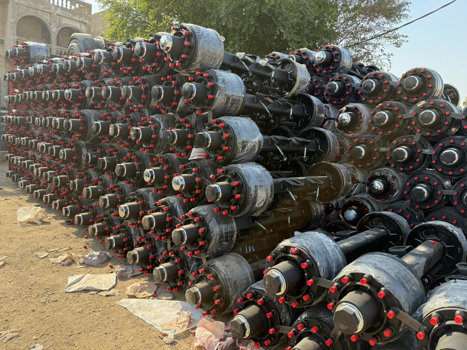woman wearing yellow long-sleeved dress under white clouds and blue sky during daytime