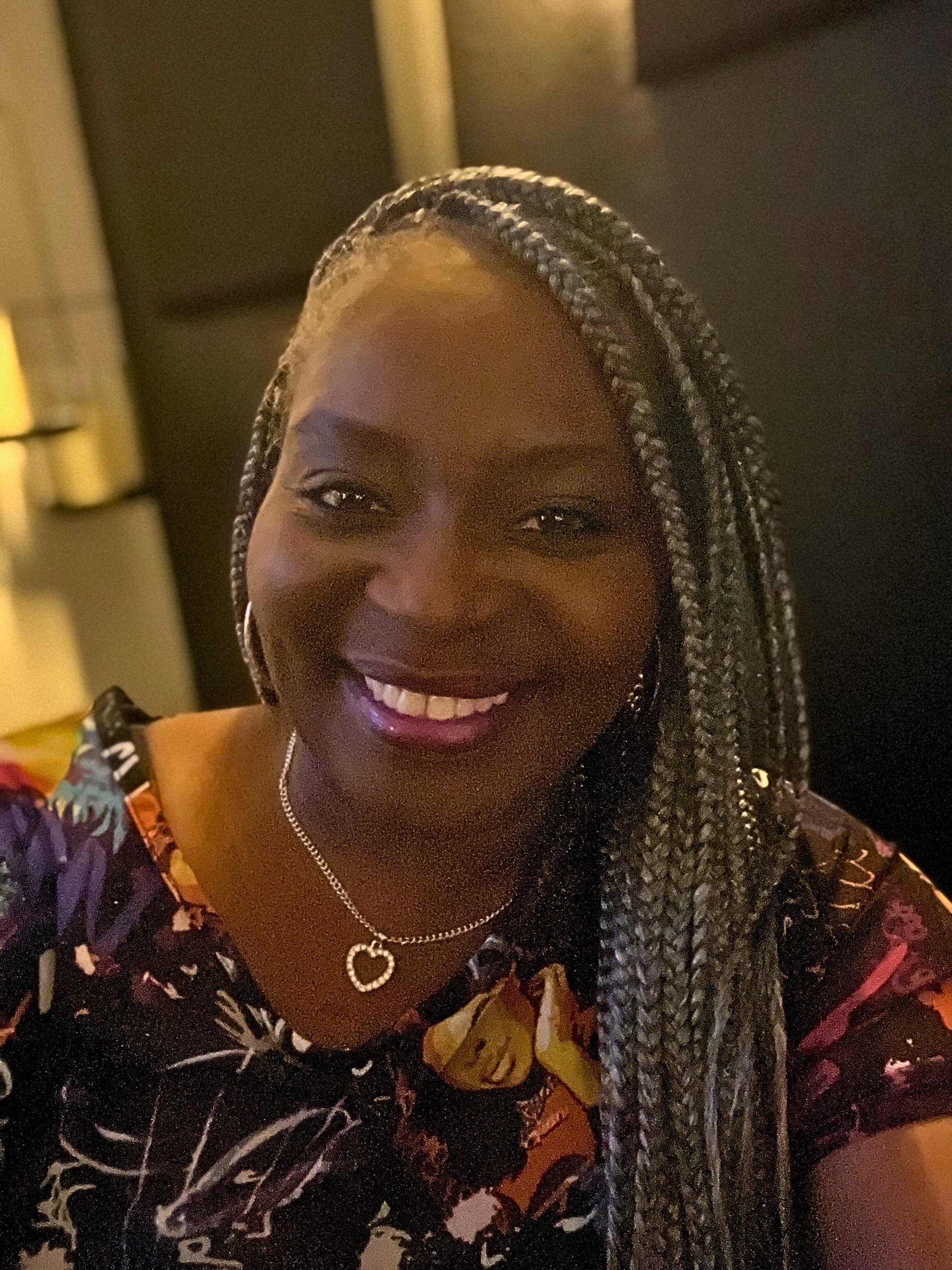 woman wearing yellow long-sleeved dress under white clouds and blue sky during daytime