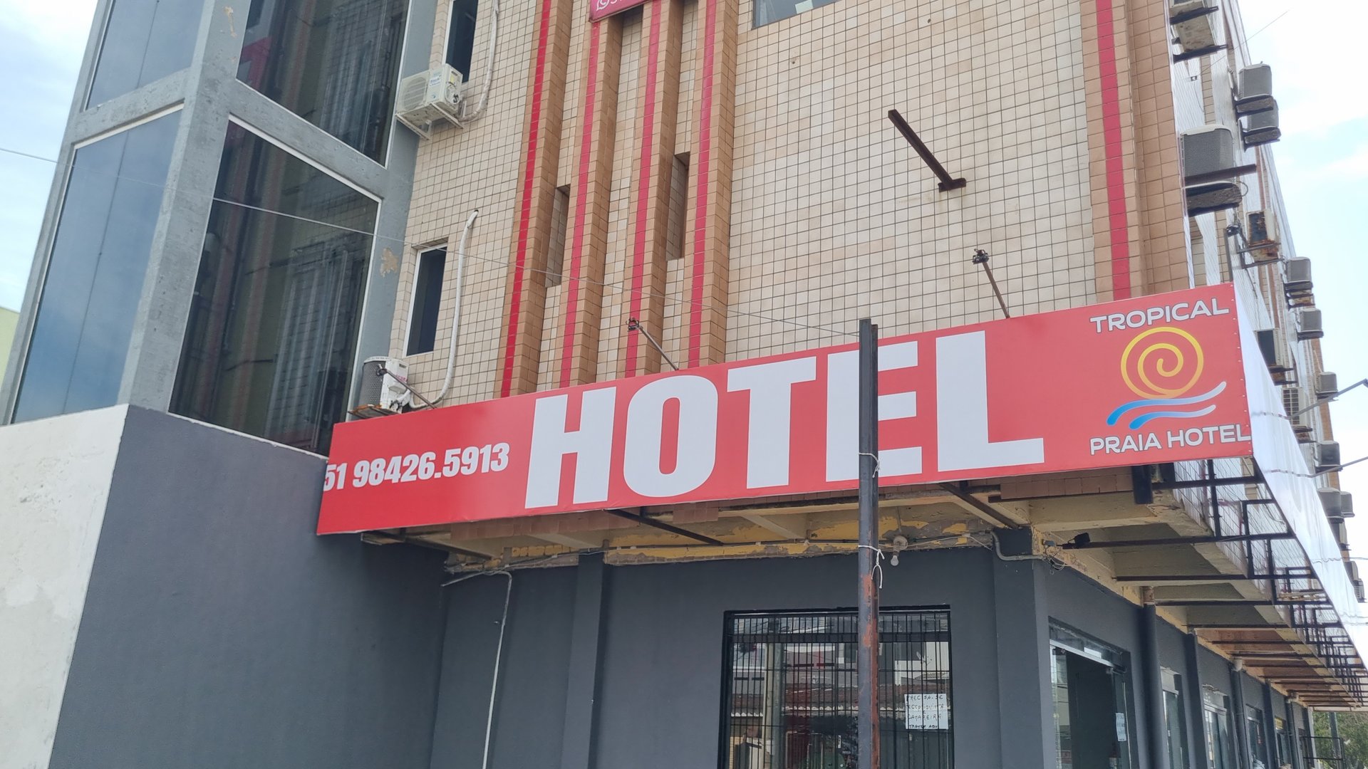 woman wearing yellow long-sleeved dress under white clouds and blue sky during daytime