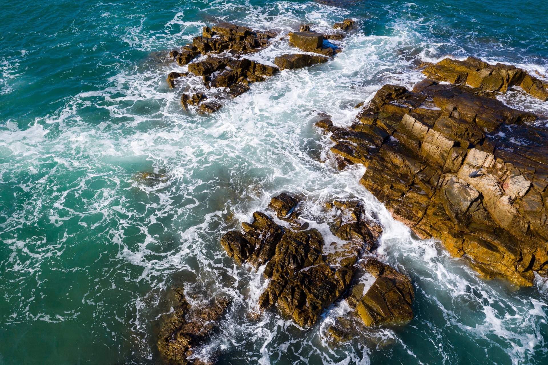 aerial photography of large body of water and shoreline