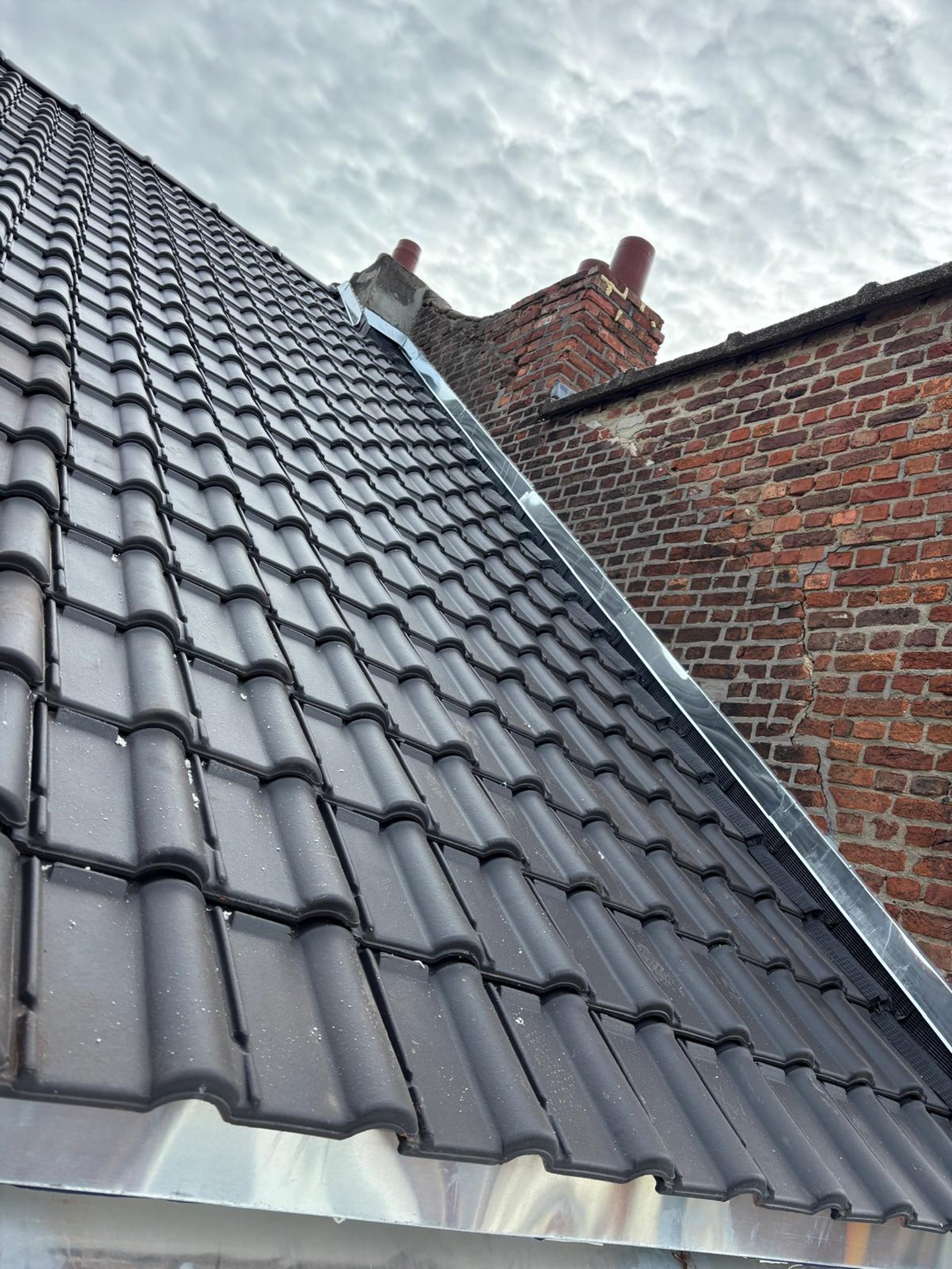 black and brown leather padded tub sofa