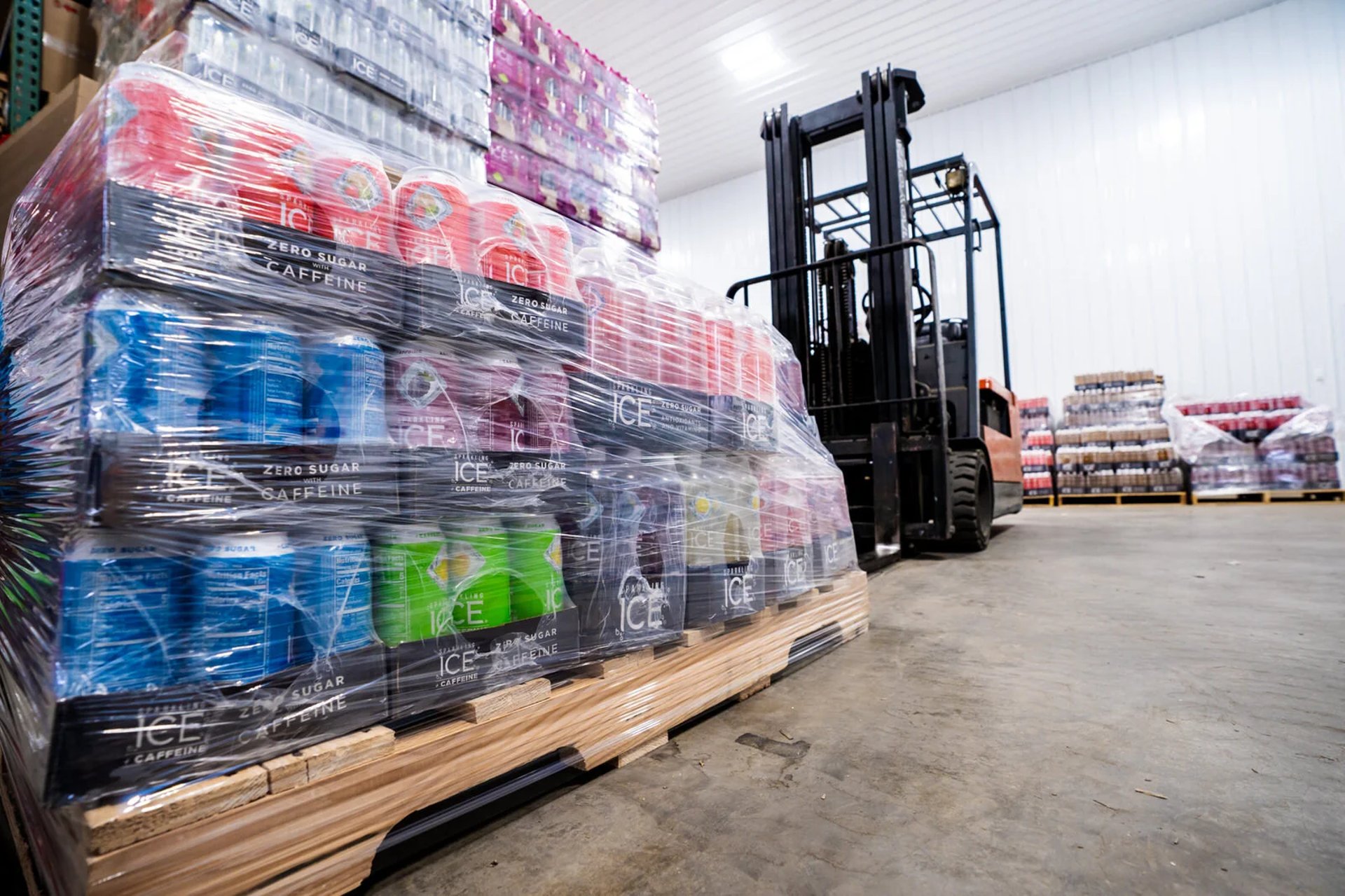 an abstract photo of a curved building with a blue sky in the background