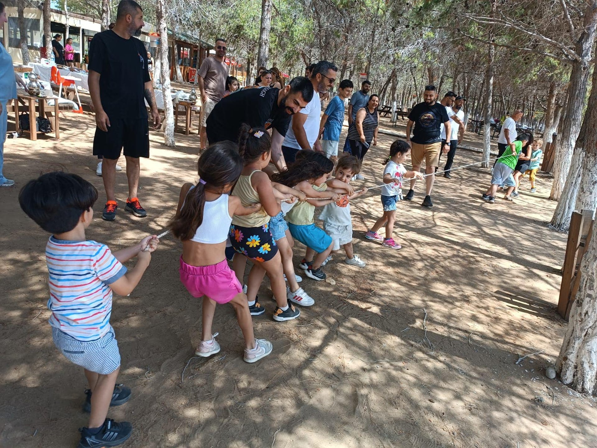 woman wearing yellow long-sleeved dress under white clouds and blue sky during daytime