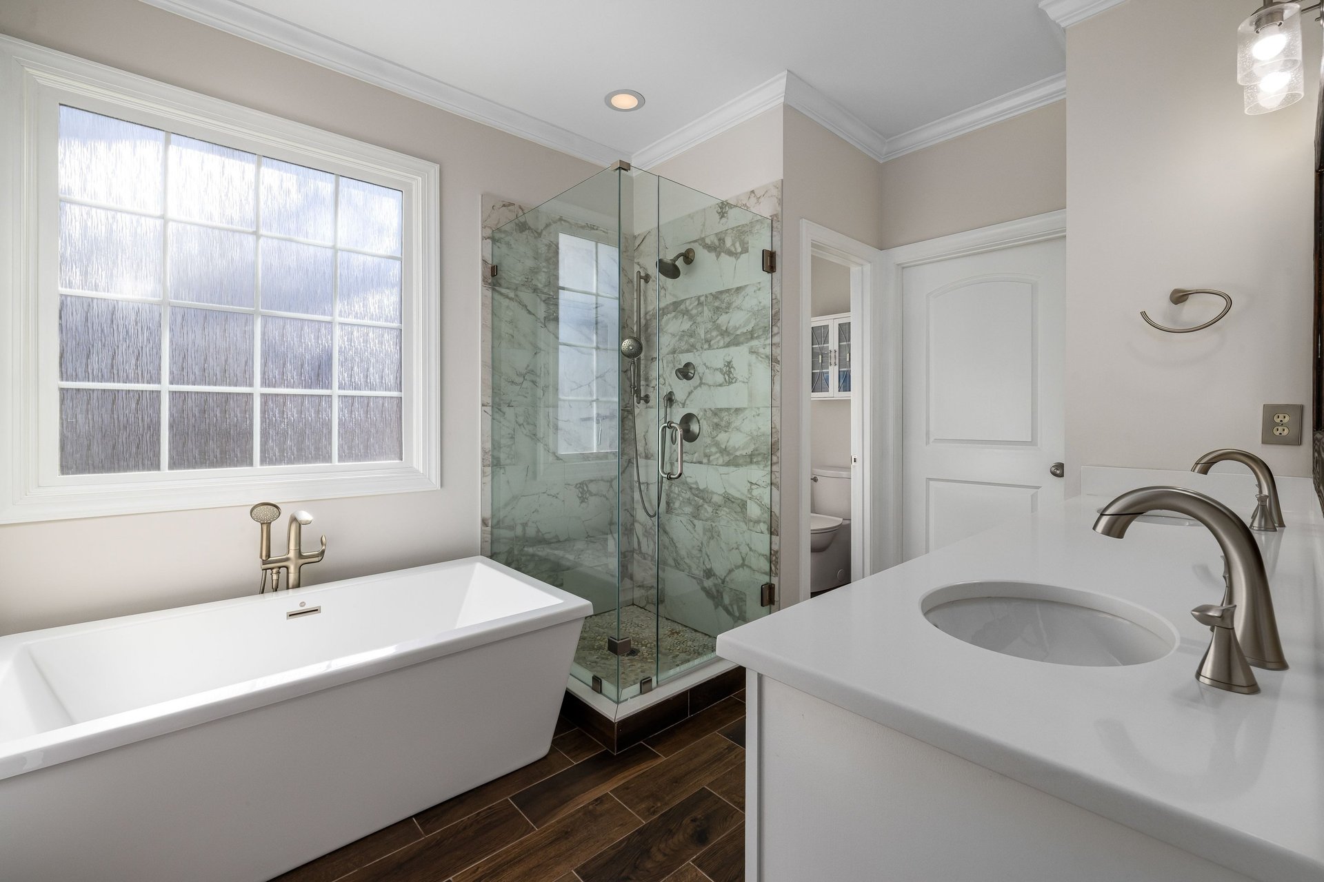 white ceramic sink with stainless steel faucet