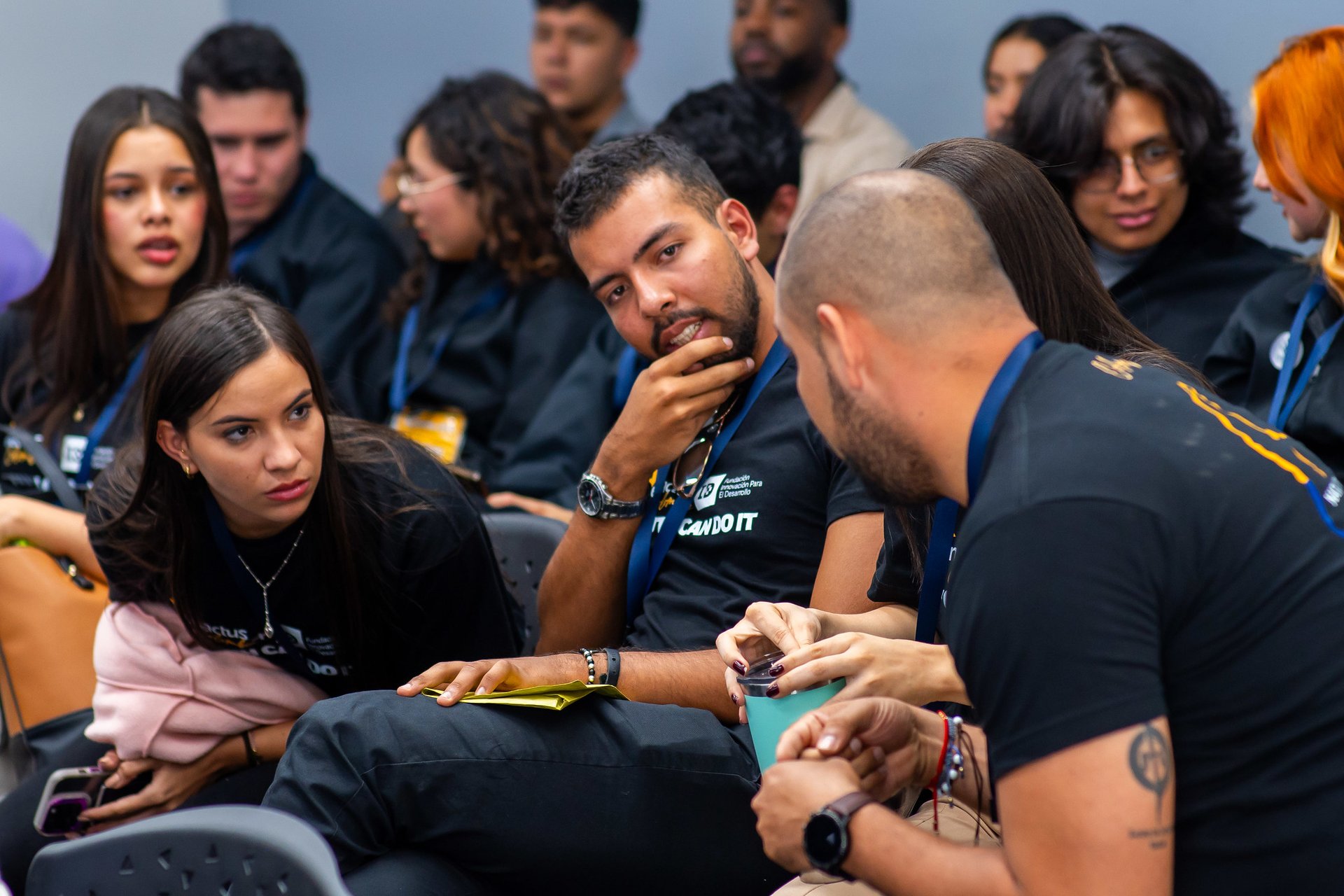 an abstract photo of a curved building with a blue sky in the background