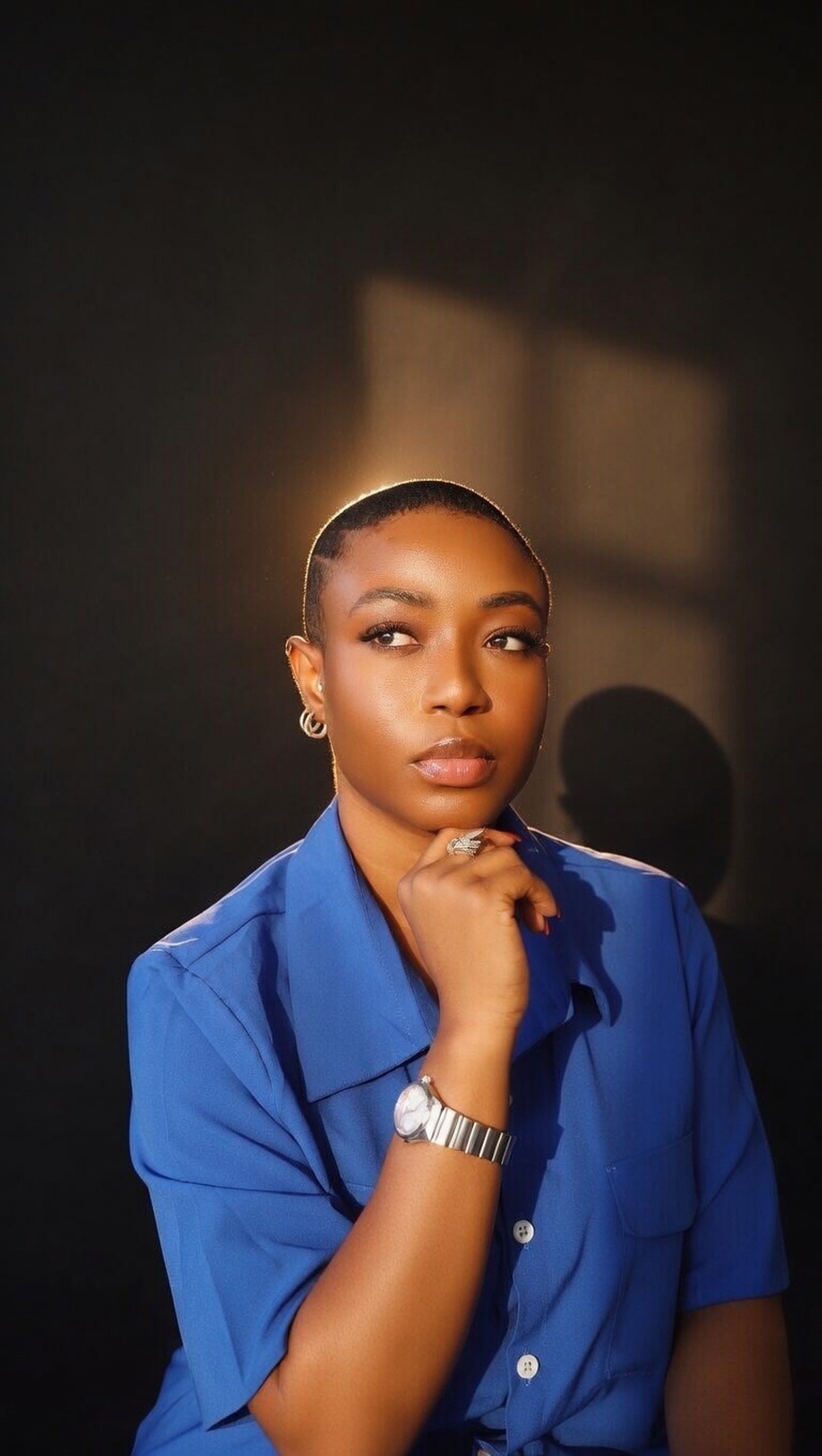 woman wearing yellow long-sleeved dress under white clouds and blue sky during daytime