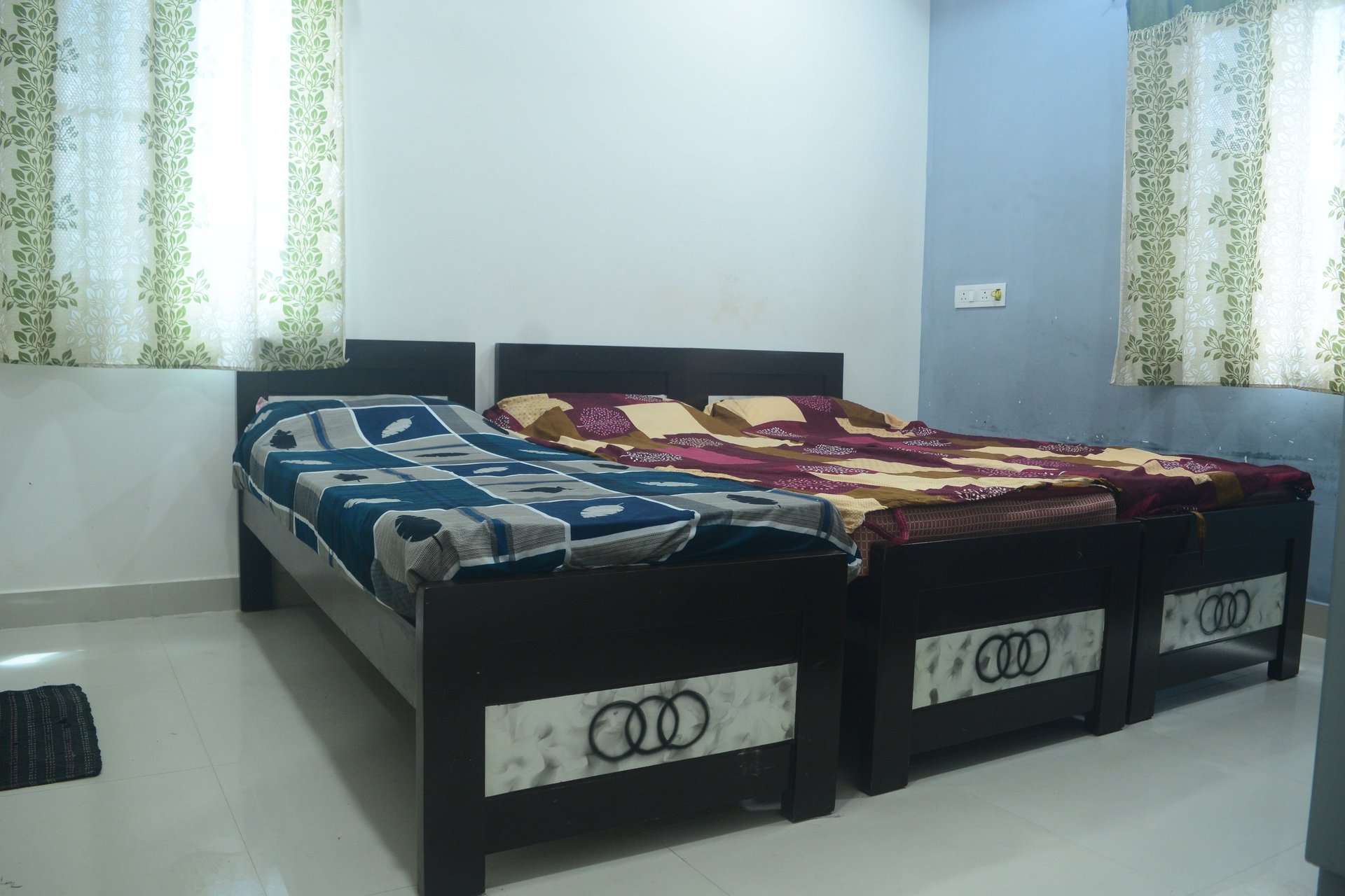 white and gray floral bed linen