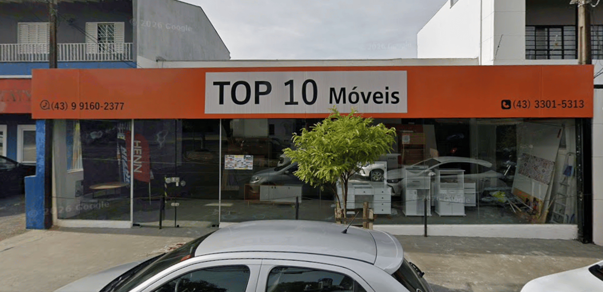 an abstract photo of a curved building with a blue sky in the background