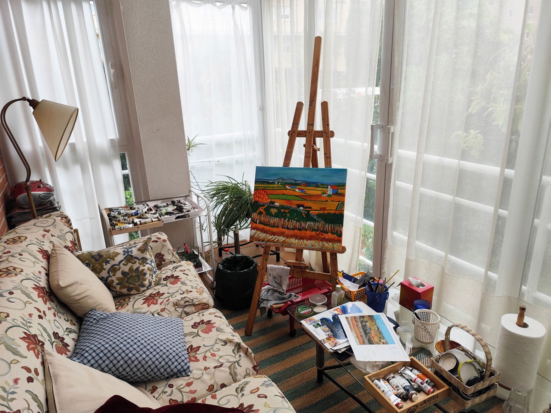 woman wearing yellow long-sleeved dress under white clouds and blue sky during daytime
