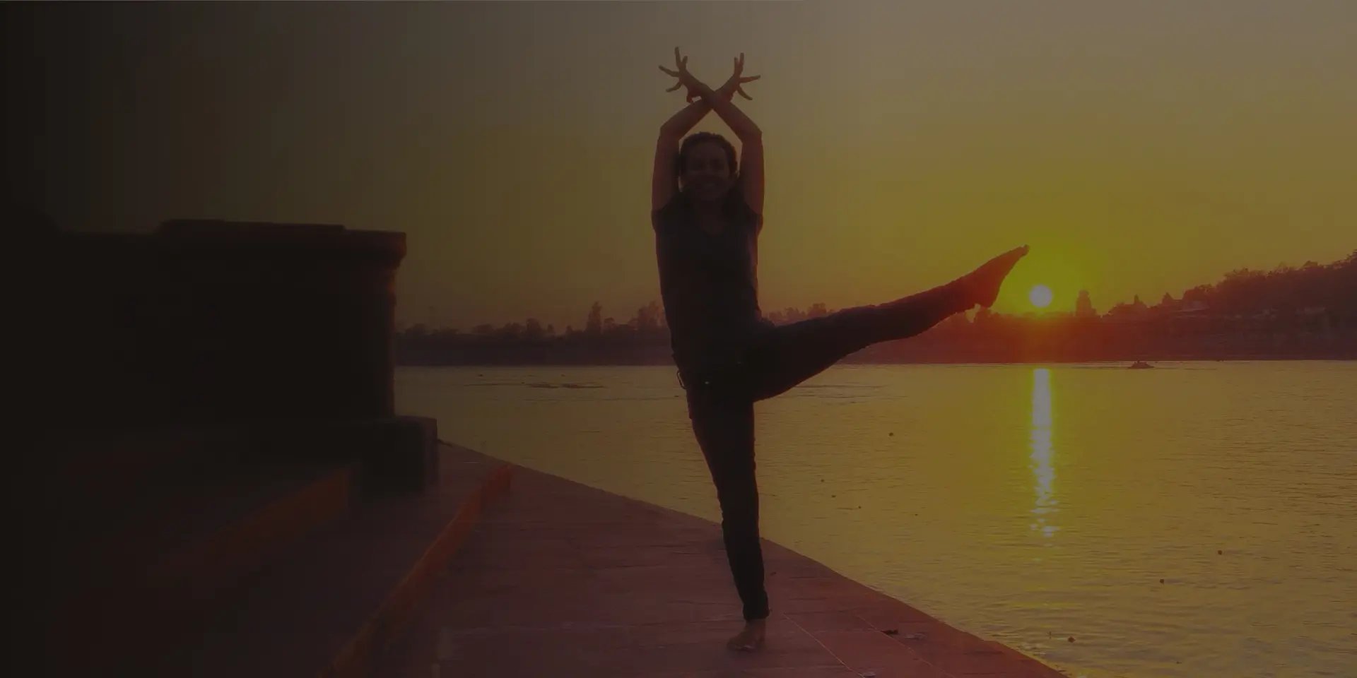 an abstract photo of a curved building with a blue sky in the background