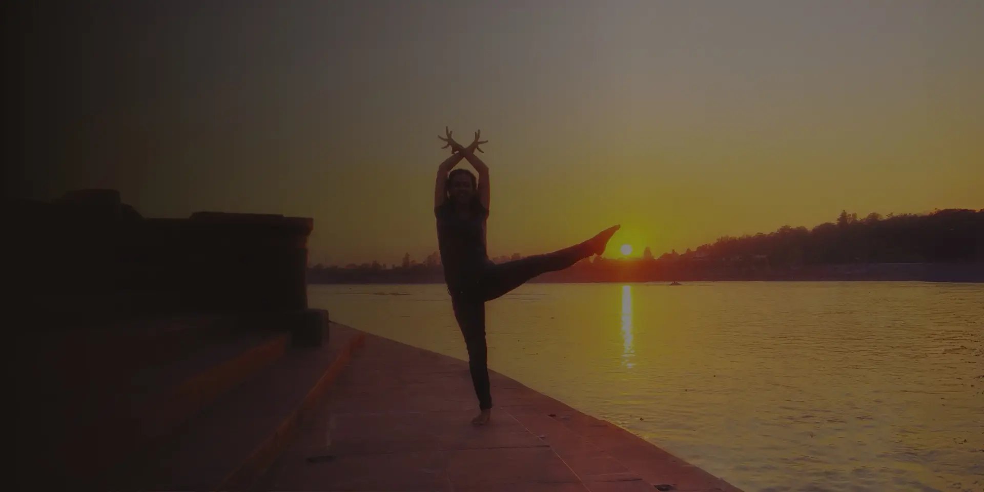 an abstract photo of a curved building with a blue sky in the background