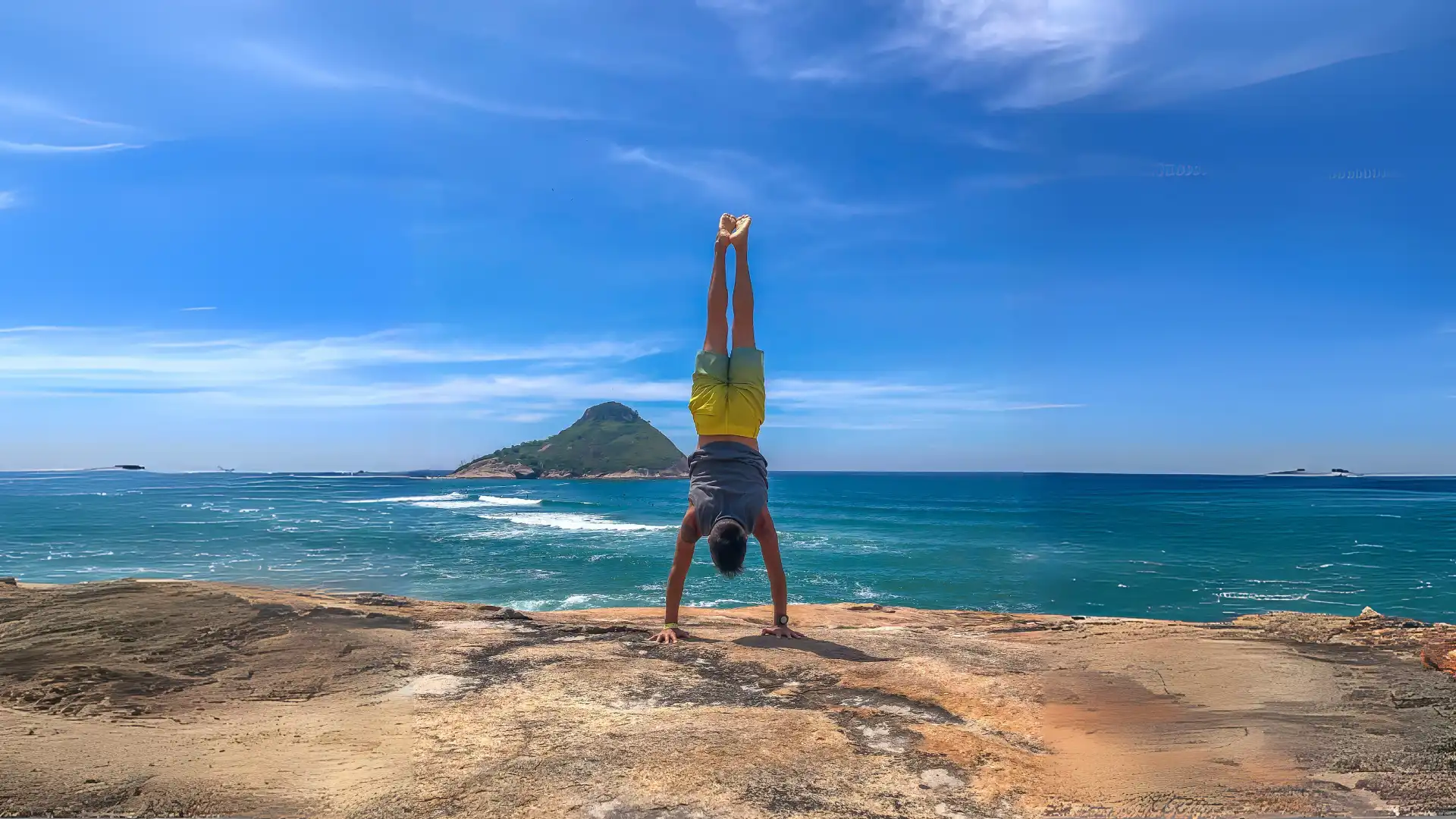 an abstract photo of a curved building with a blue sky in the background