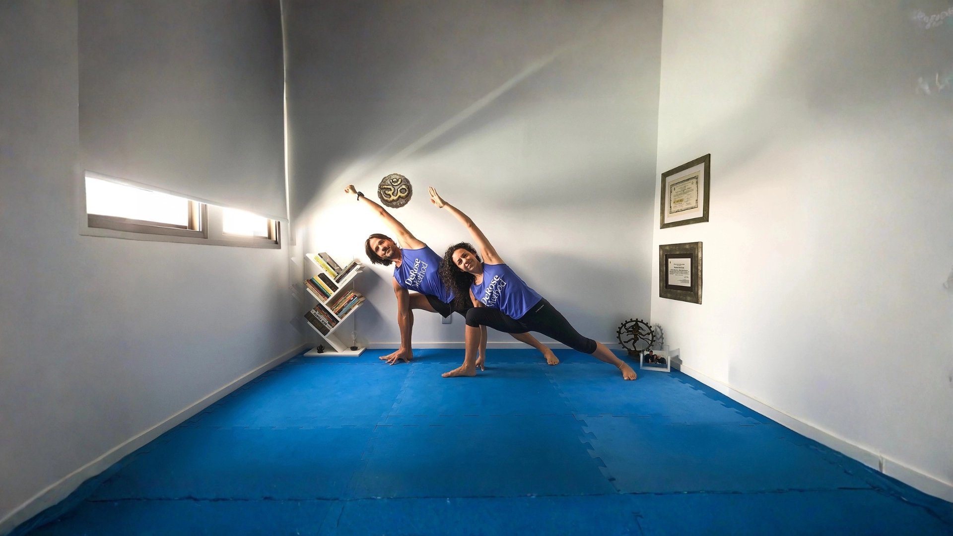 an abstract photo of a curved building with a blue sky in the background