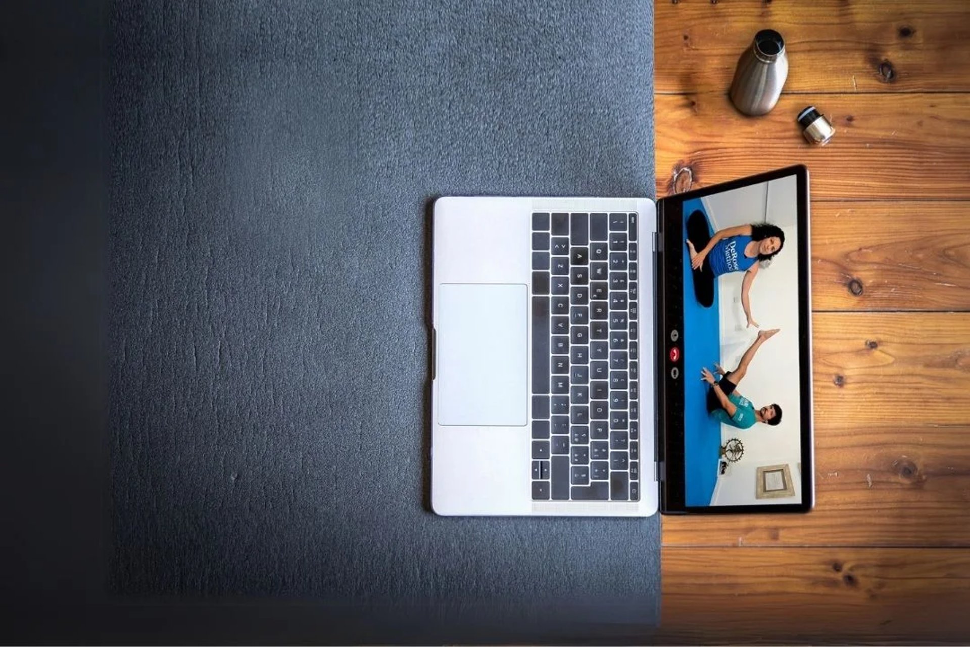 an abstract photo of a curved building with a blue sky in the background