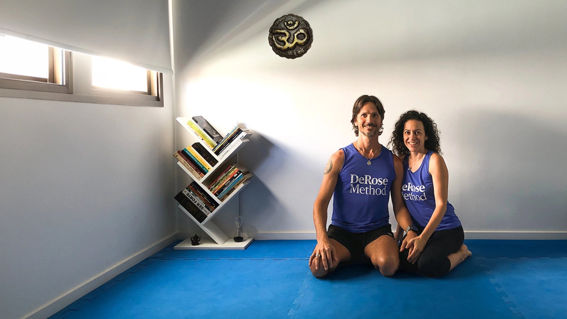 an abstract photo of a curved building with a blue sky in the background