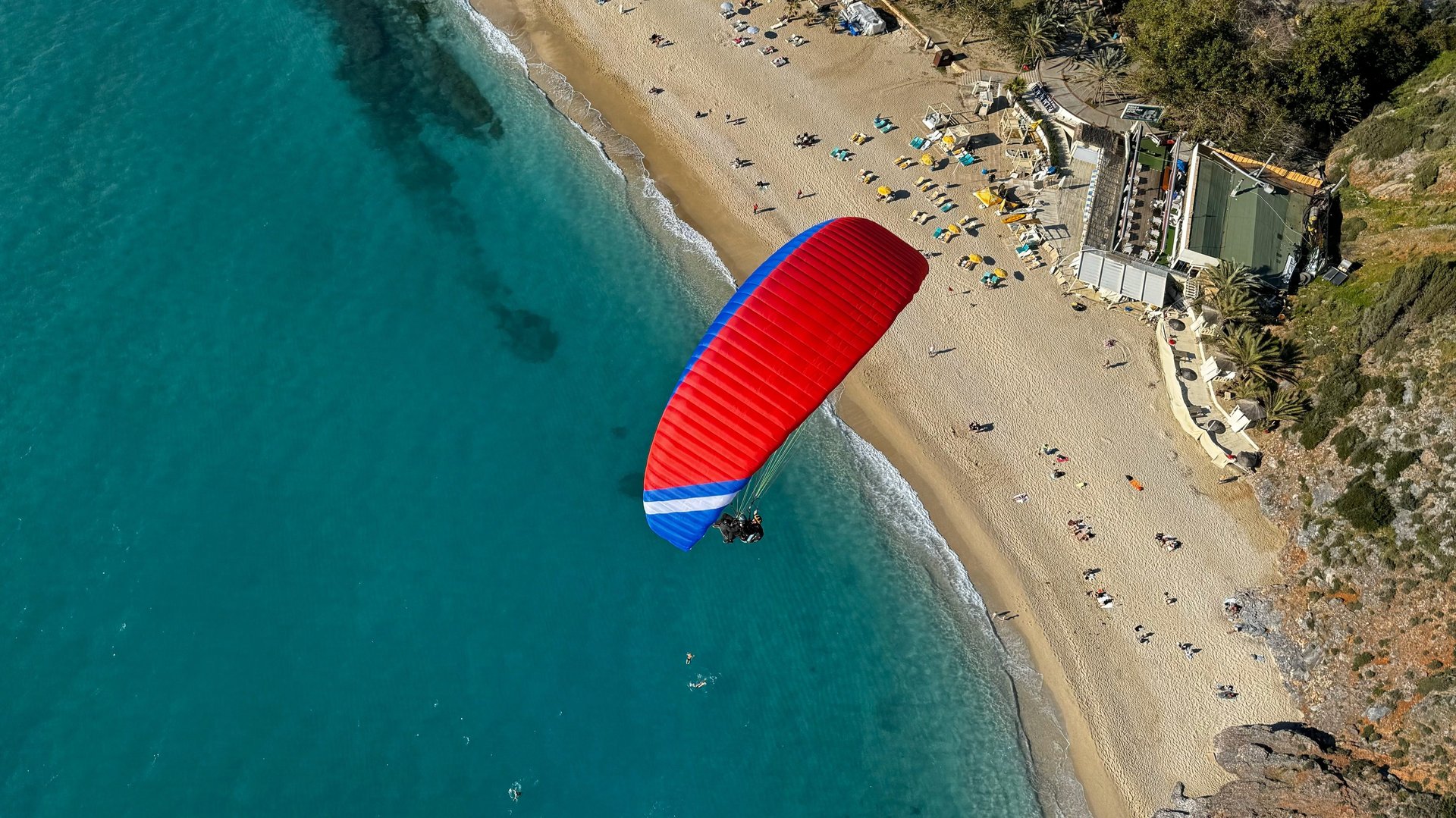 weFLY Tandem Paraglider over beach