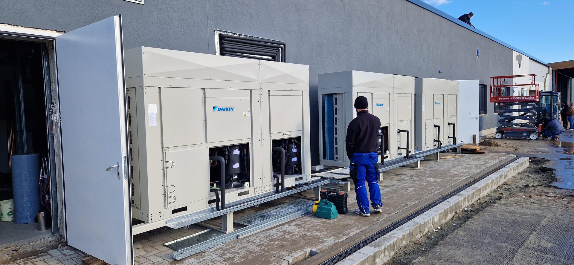 woman wearing yellow long-sleeved dress under white clouds and blue sky during daytime