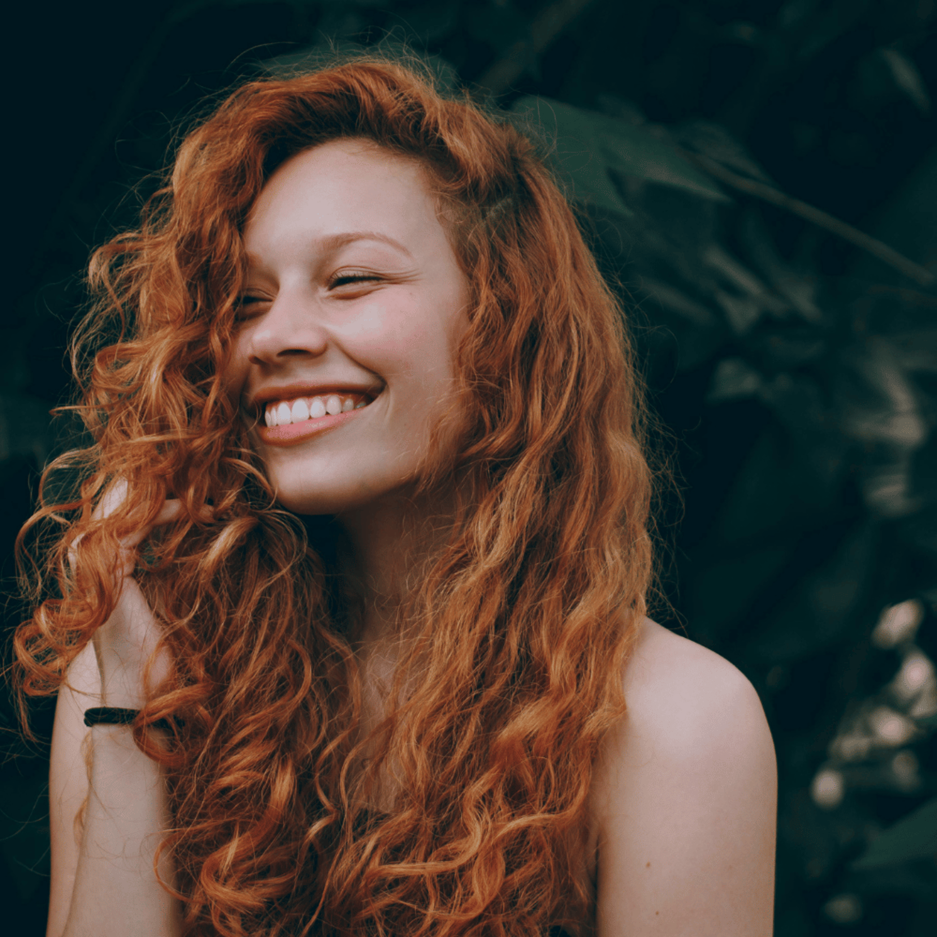 closeup photography of woman smiling