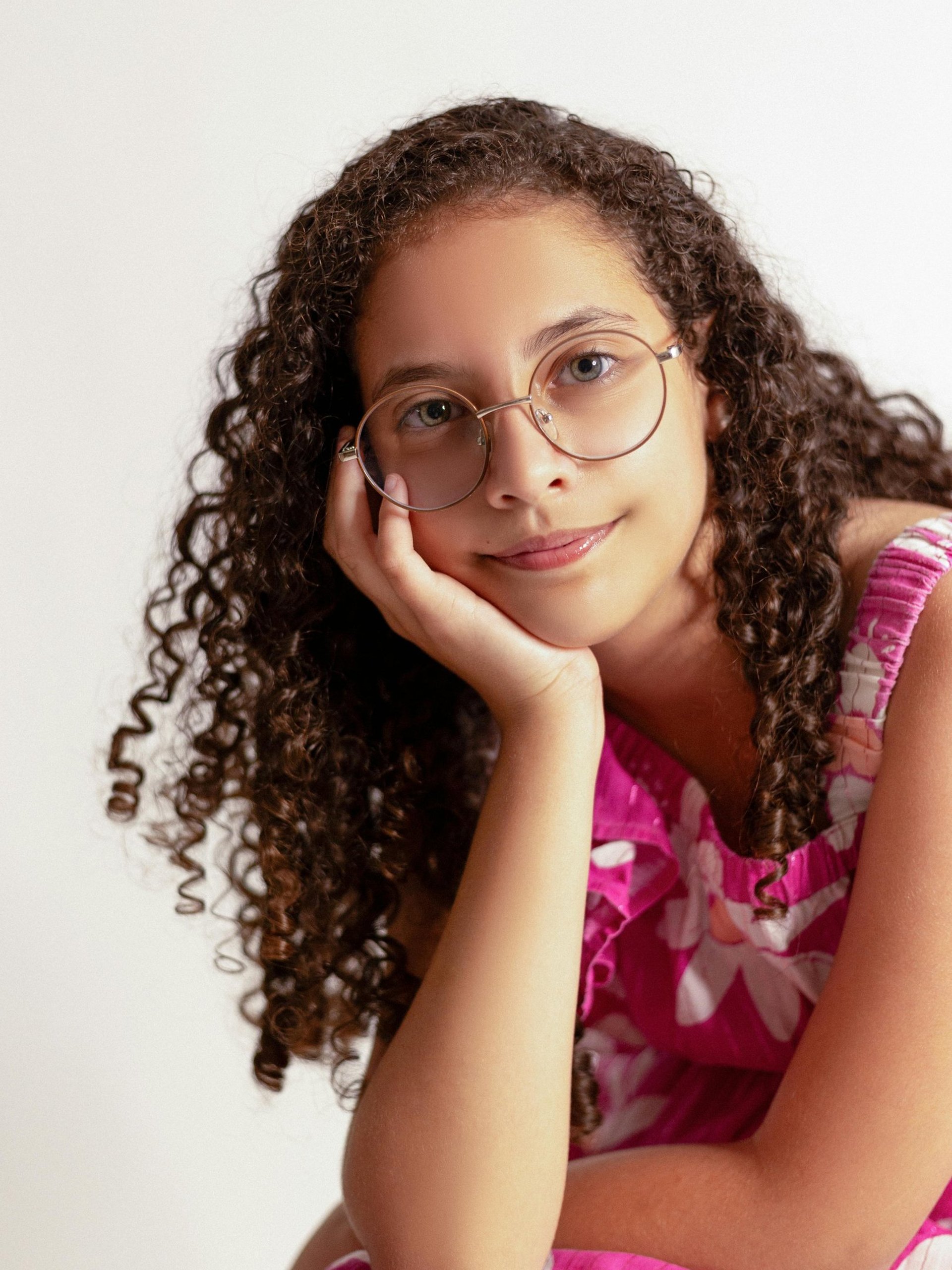 two women holding flowers
