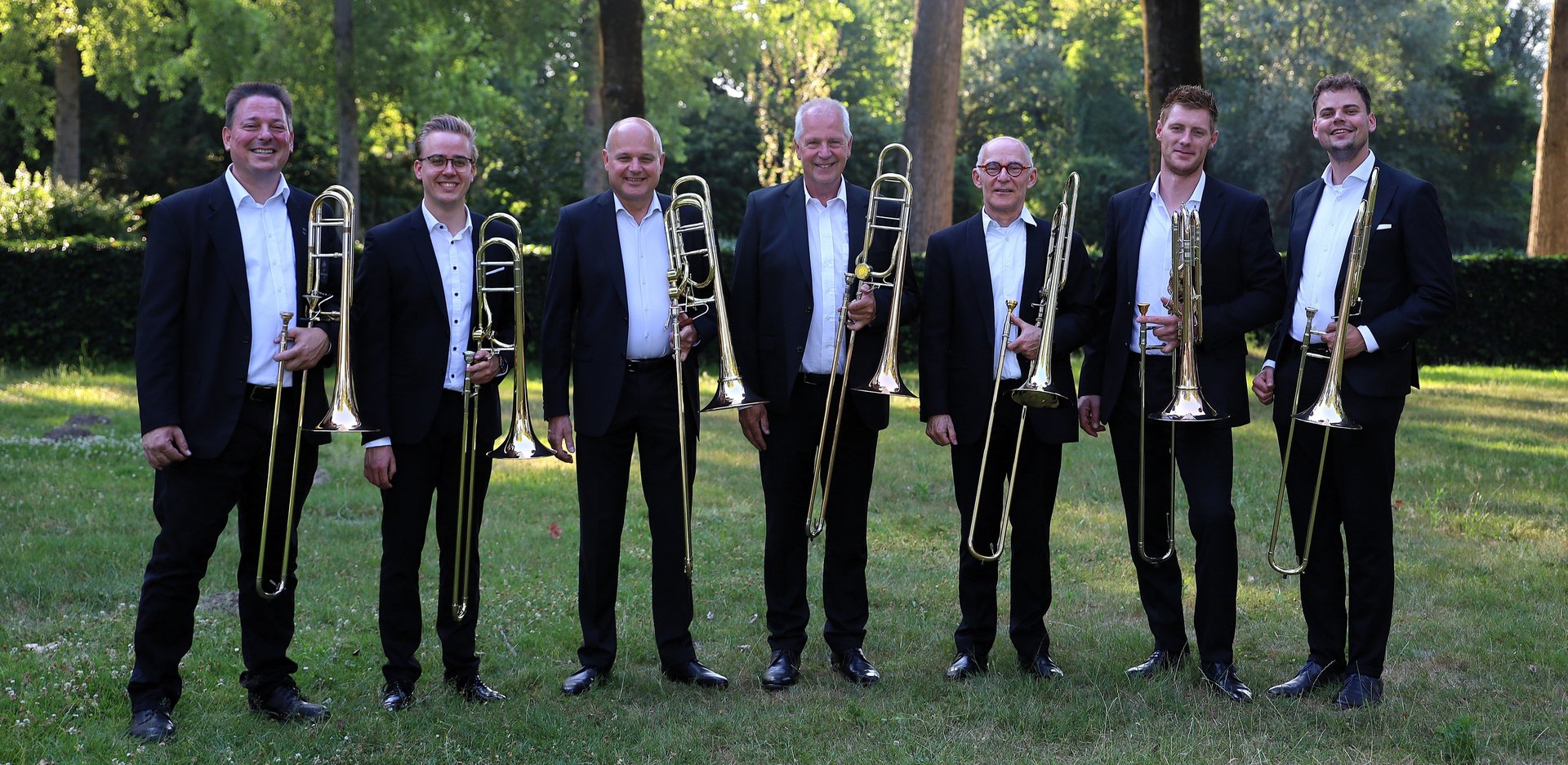 black and brown leather padded tub sofa