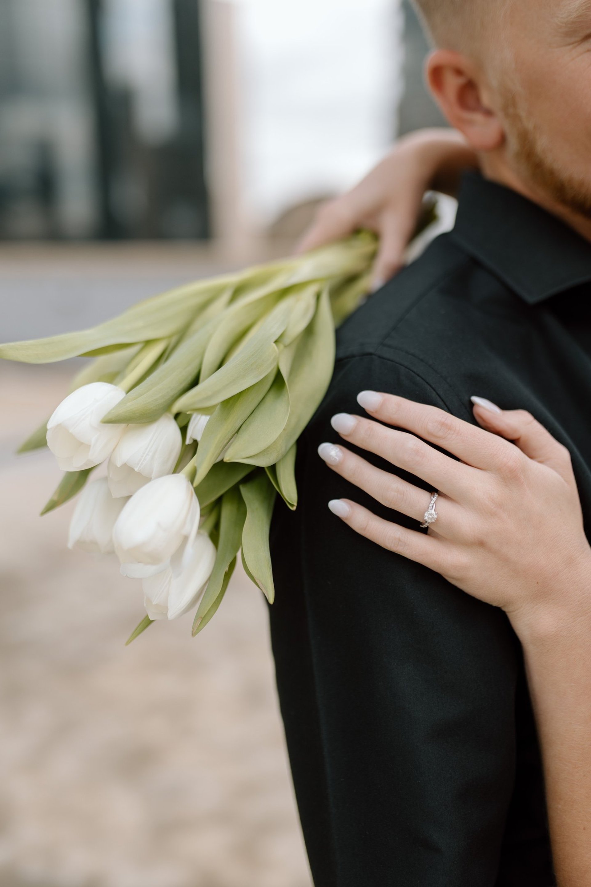 couple wearing silver-colored rings