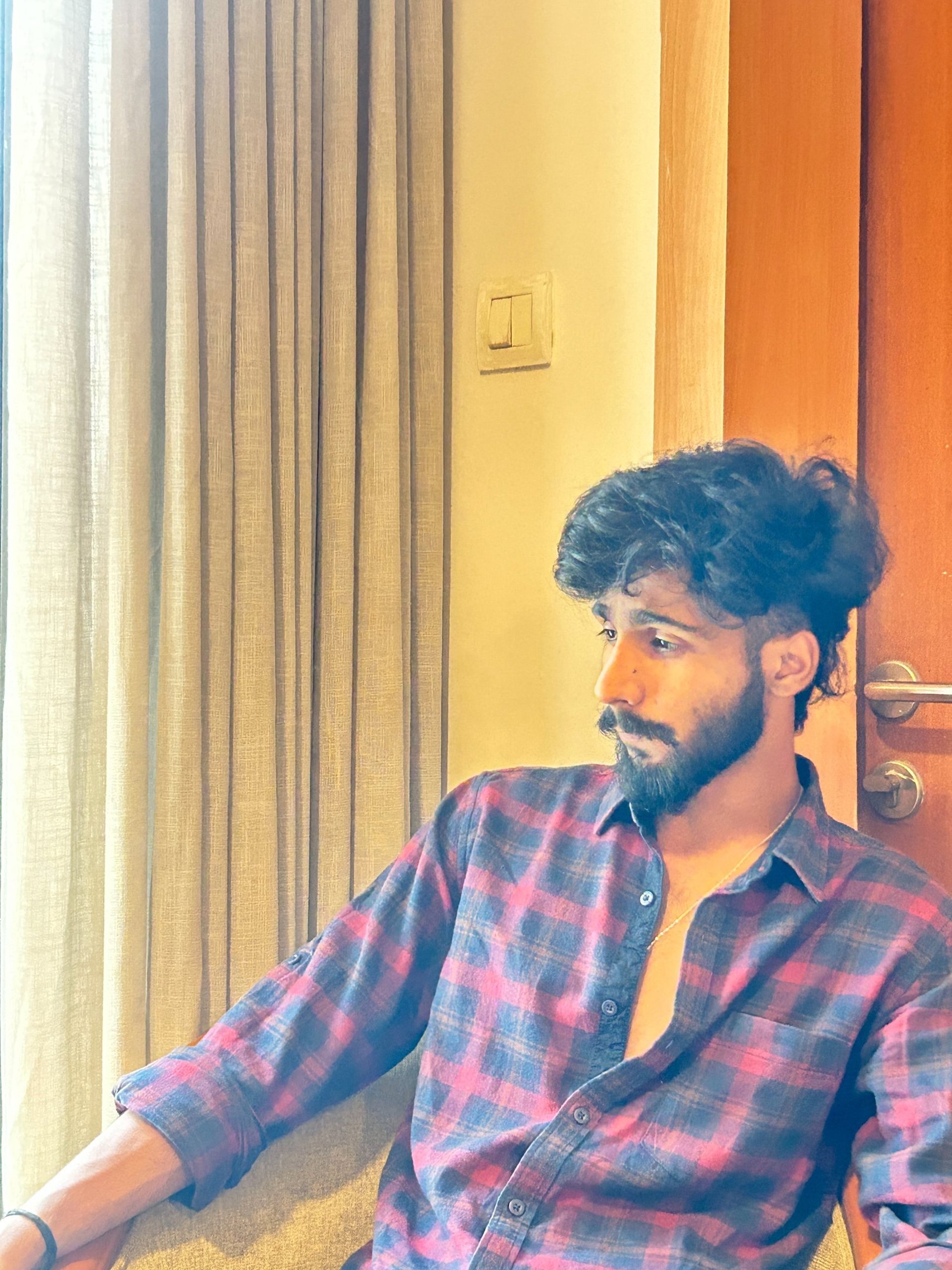 woman wearing yellow long-sleeved dress under white clouds and blue sky during daytime