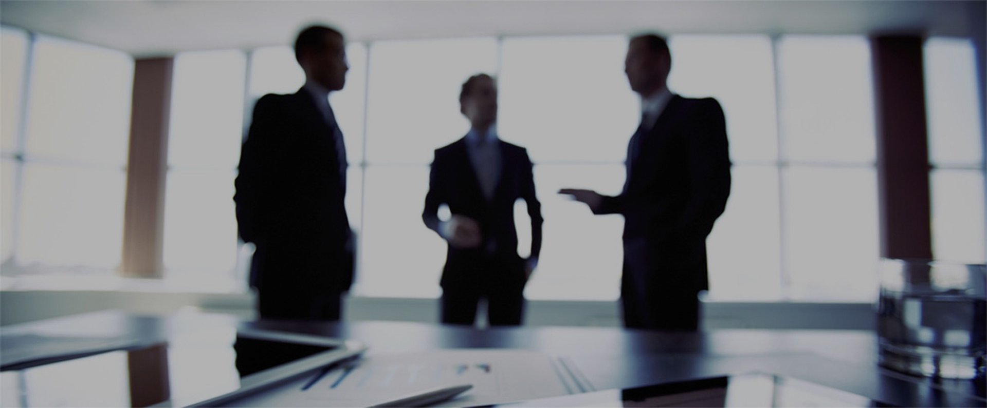 an abstract photo of a curved building with a blue sky in the background