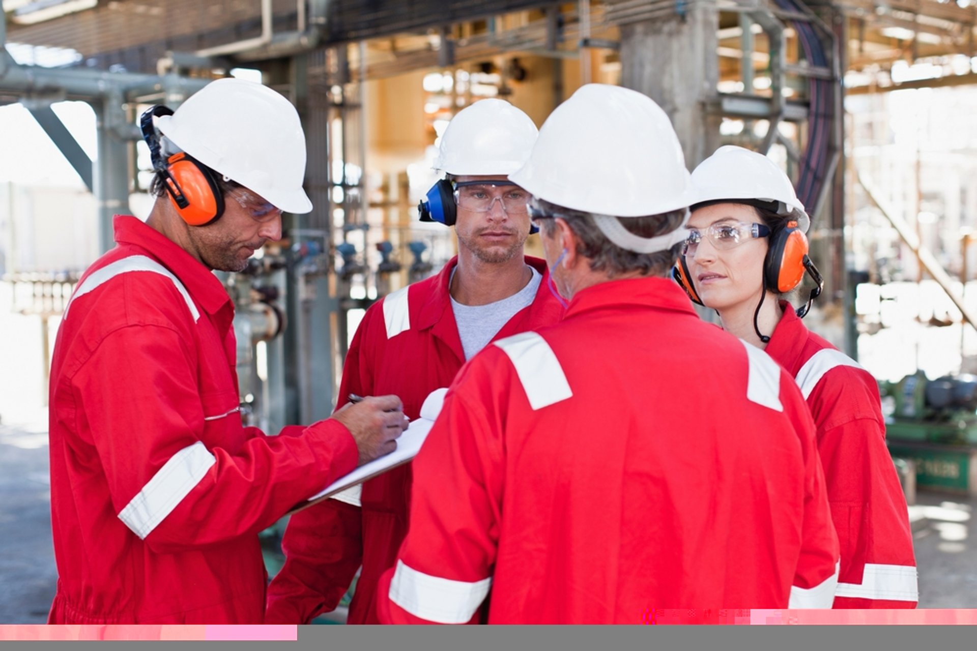 an abstract photo of a curved building with a blue sky in the background