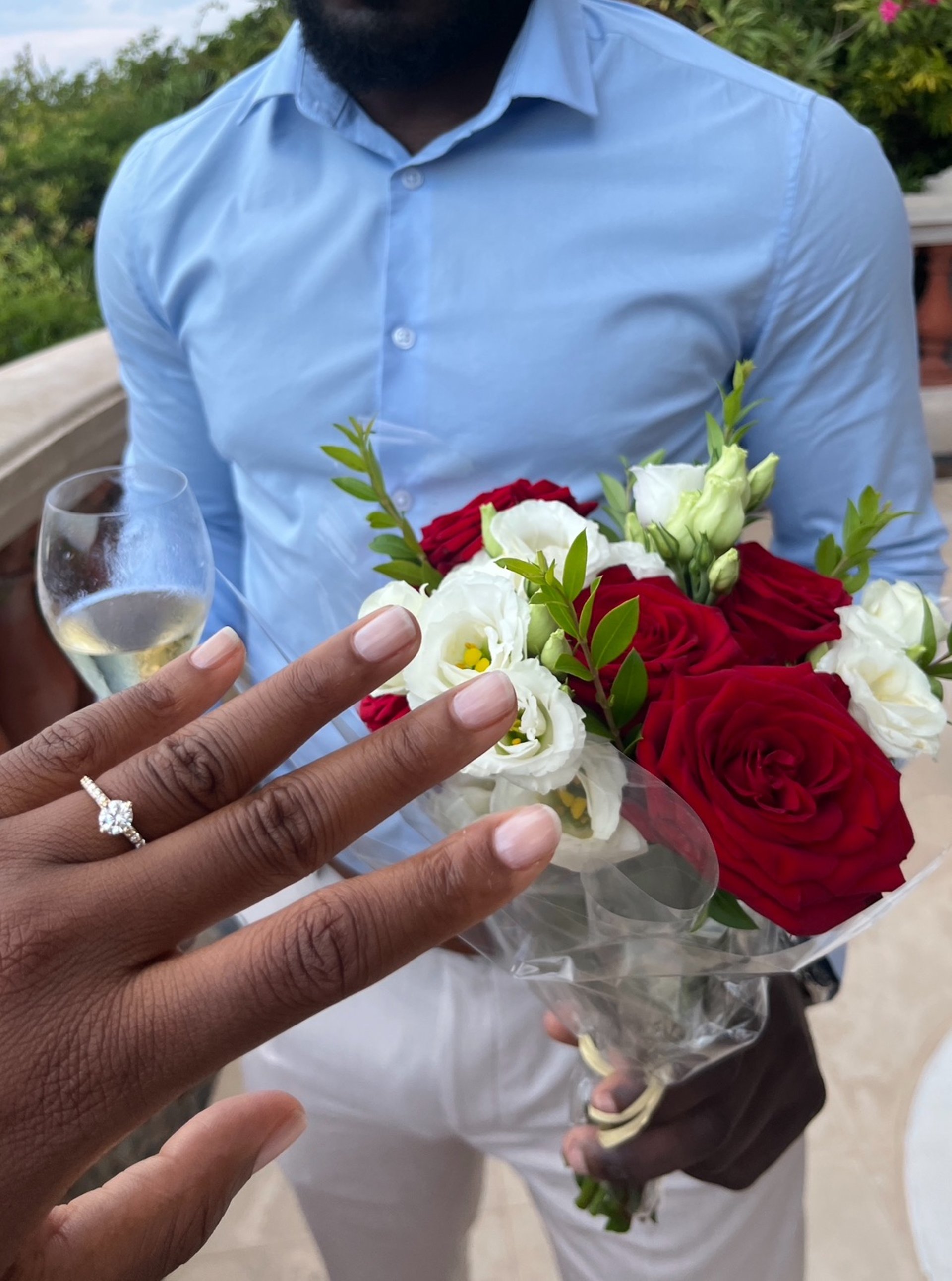 couple wearing silver-colored rings
