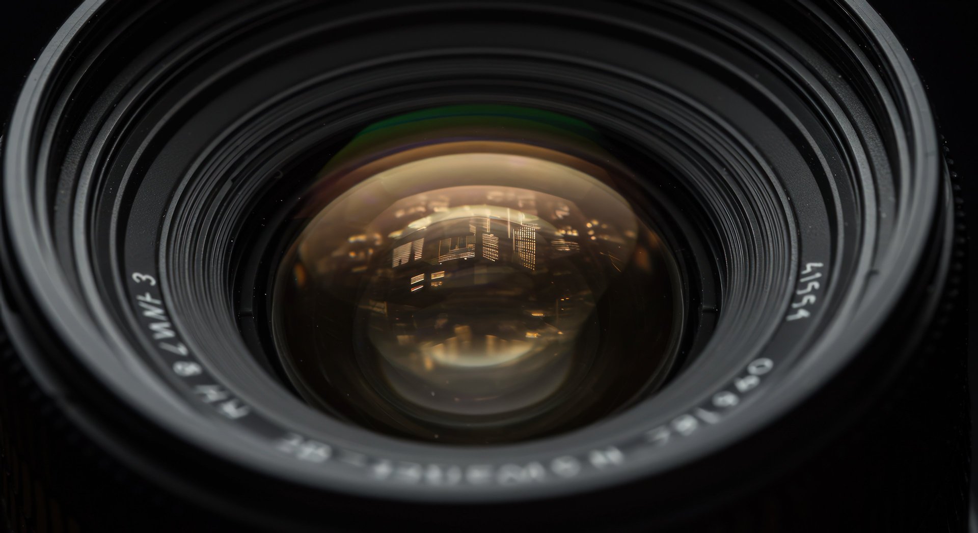 an abstract photo of a curved building with a blue sky in the background
