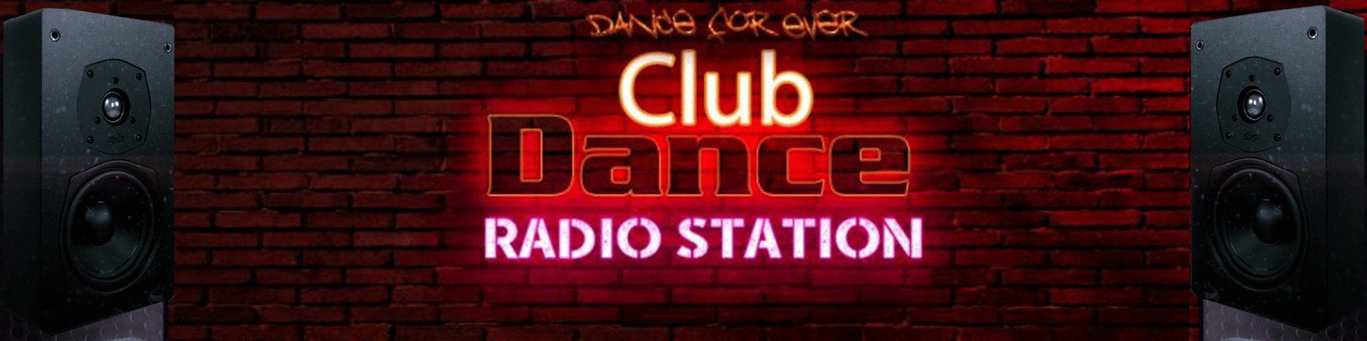 a stage with a laptop and microphone in front of a crowd