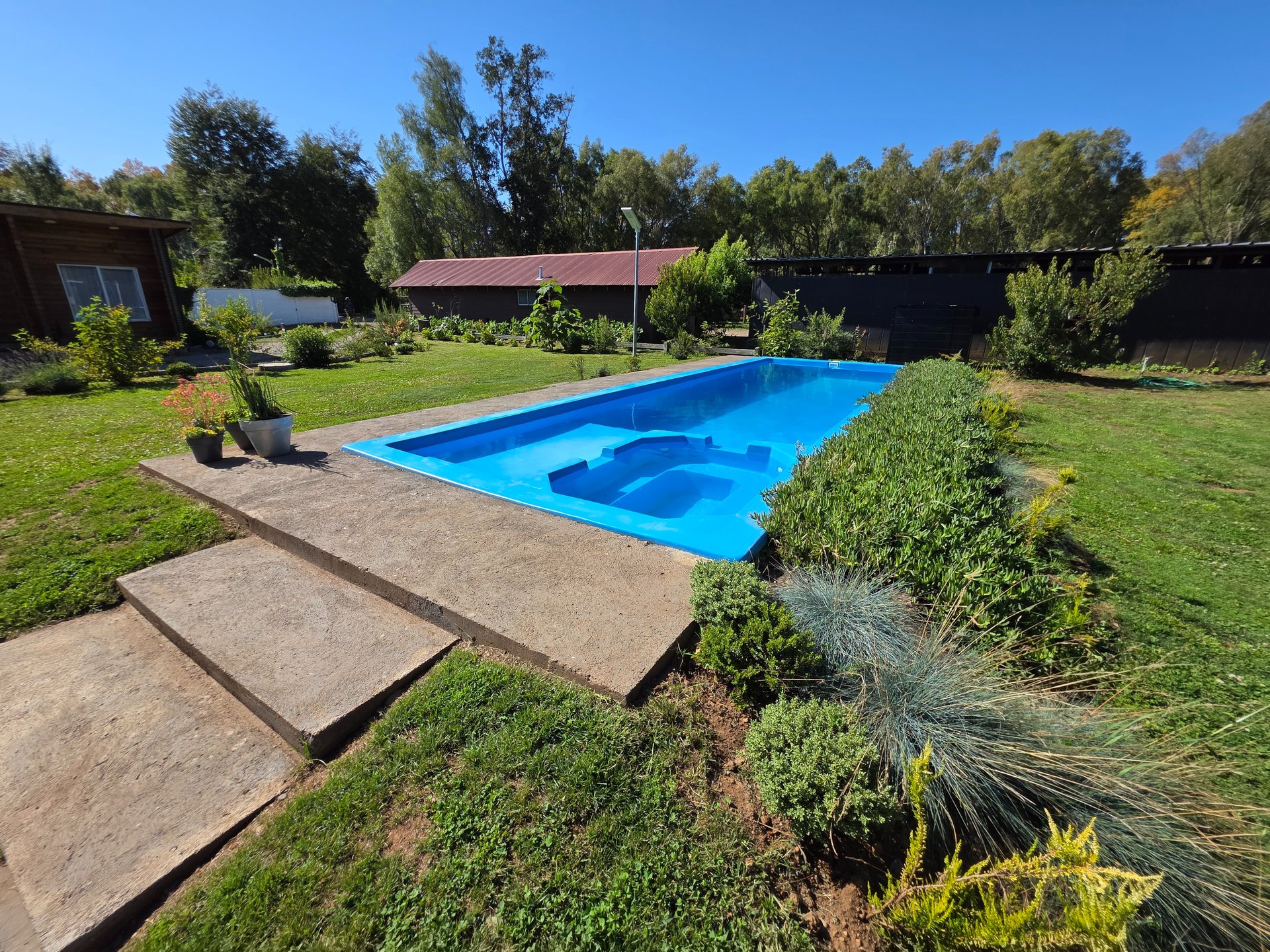 woman wearing yellow long-sleeved dress under white clouds and blue sky during daytime