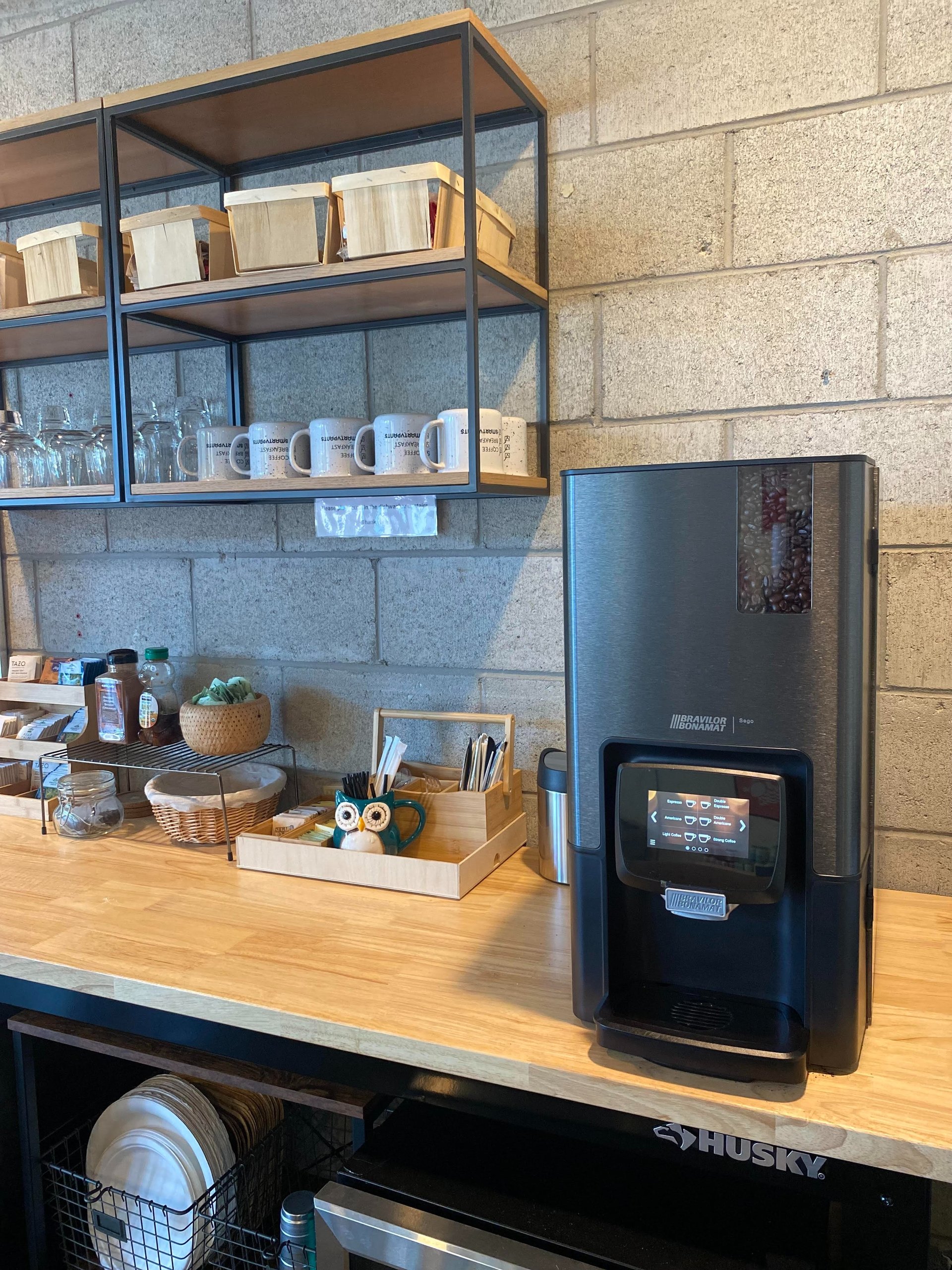 black and brown leather padded tub sofa