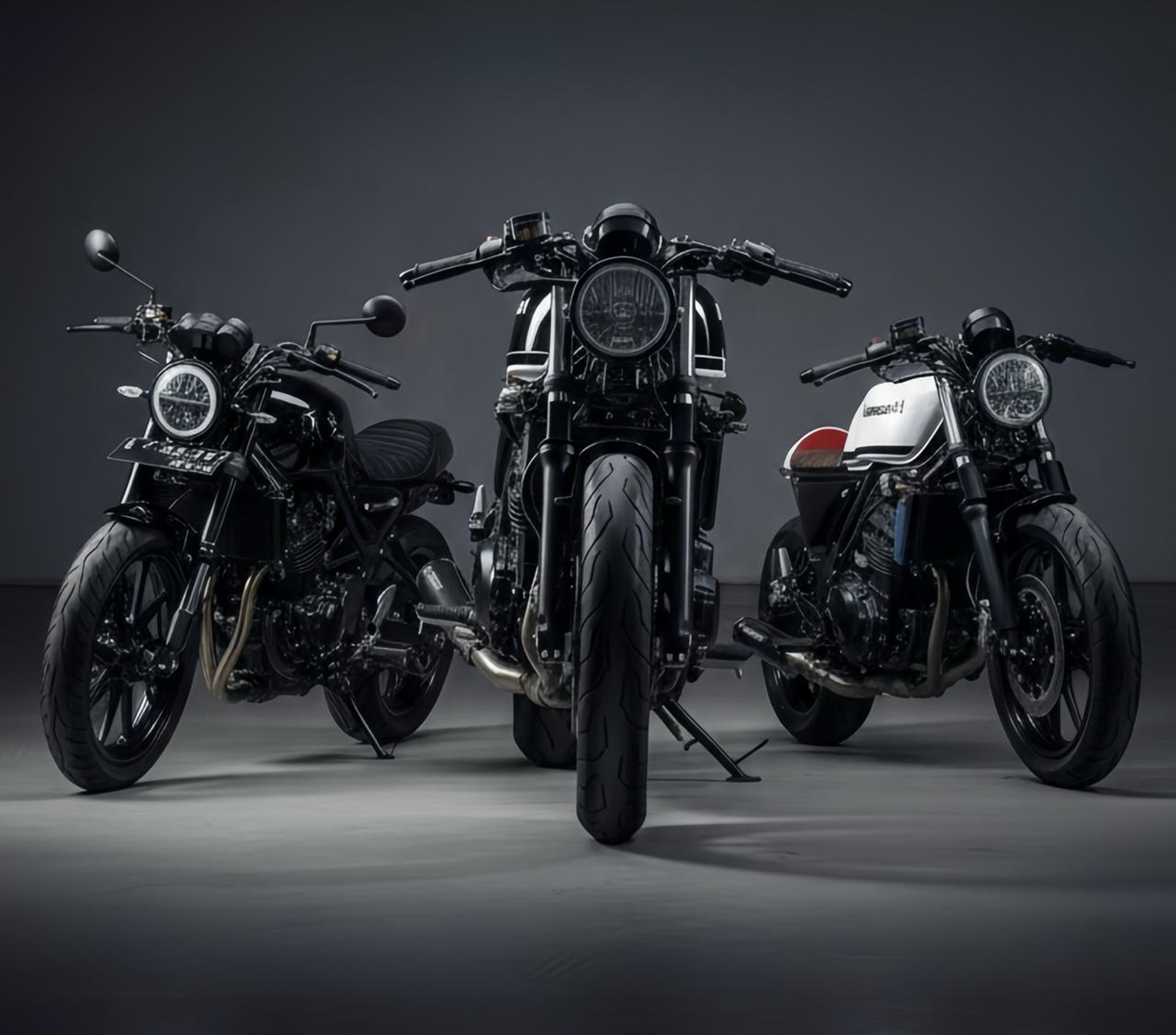 black and brown leather padded tub sofa