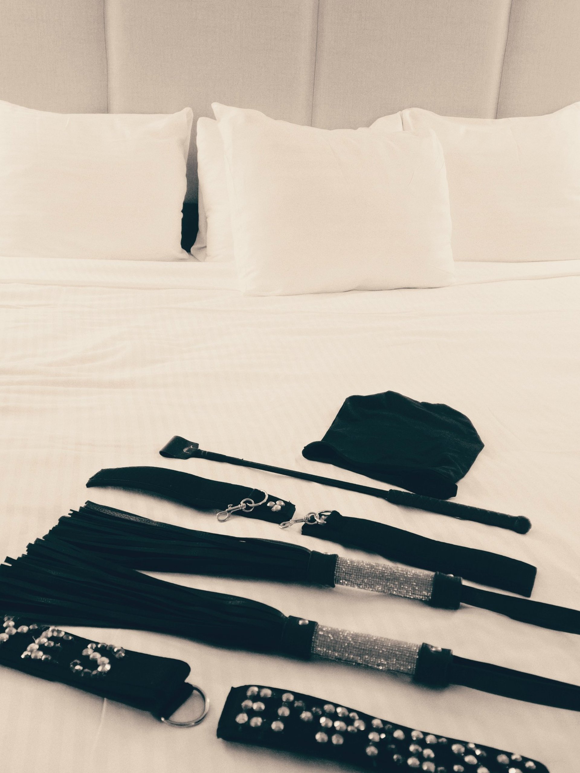 an abstract photo of a curved building with a blue sky in the background