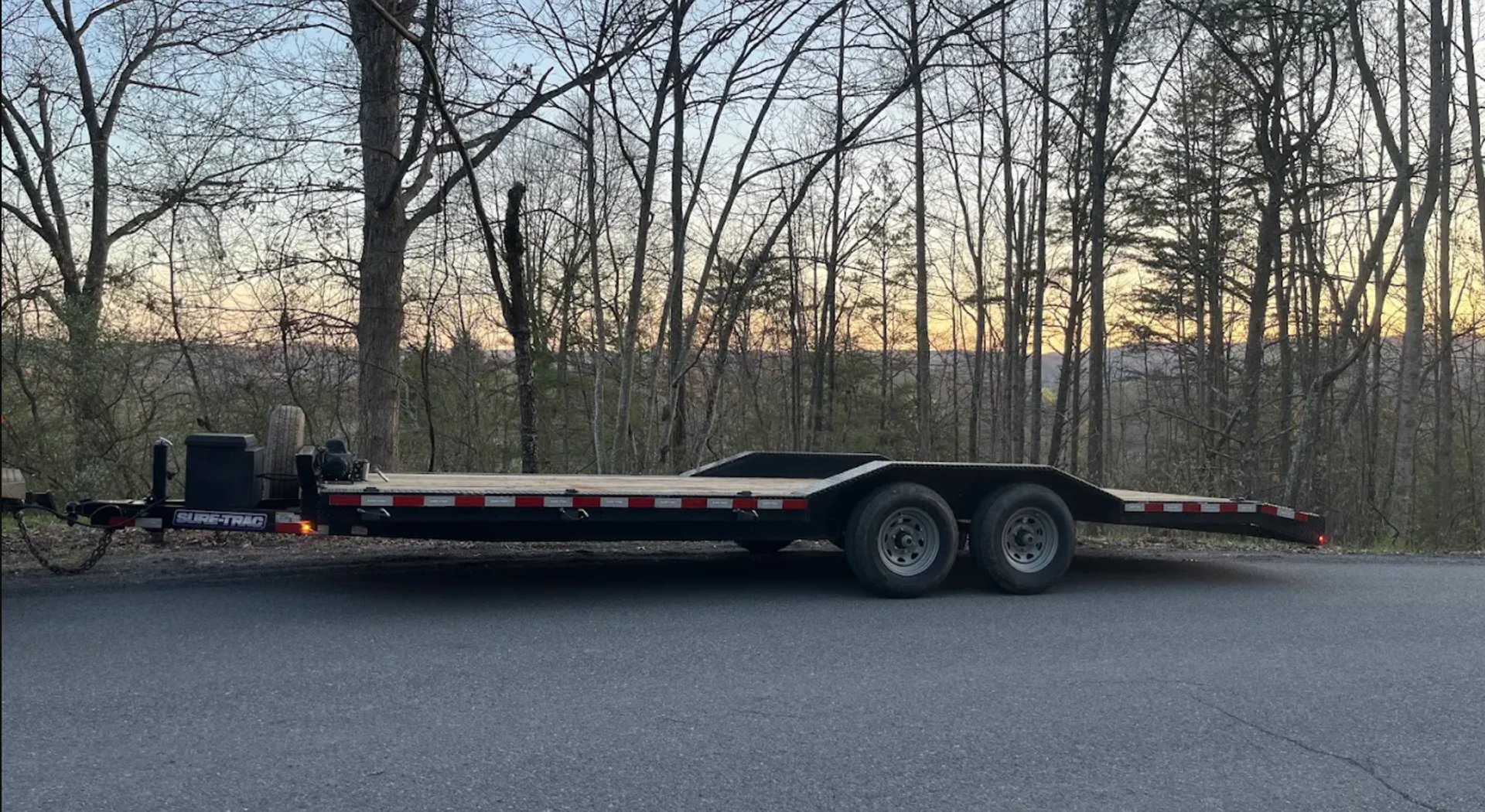 black and brown leather padded tub sofa