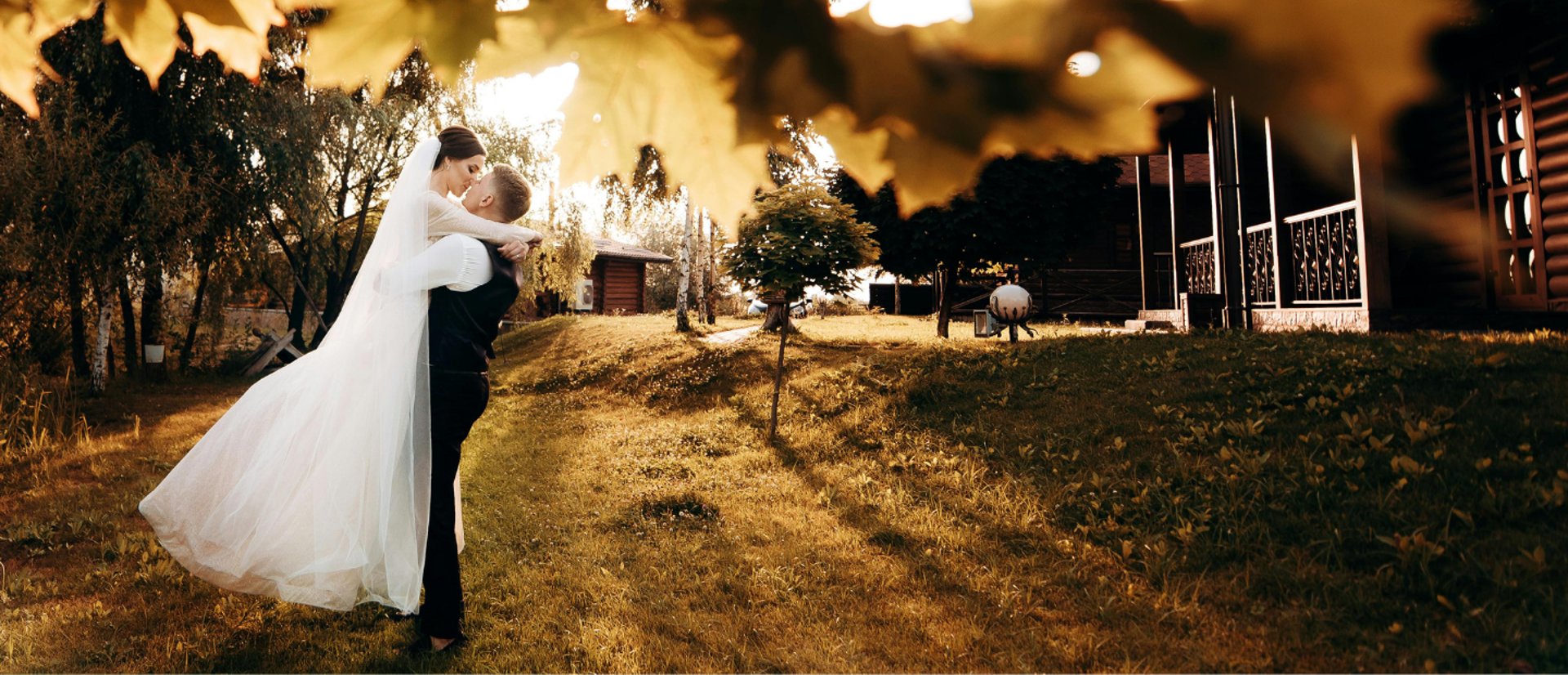 gold wedding band on white textile